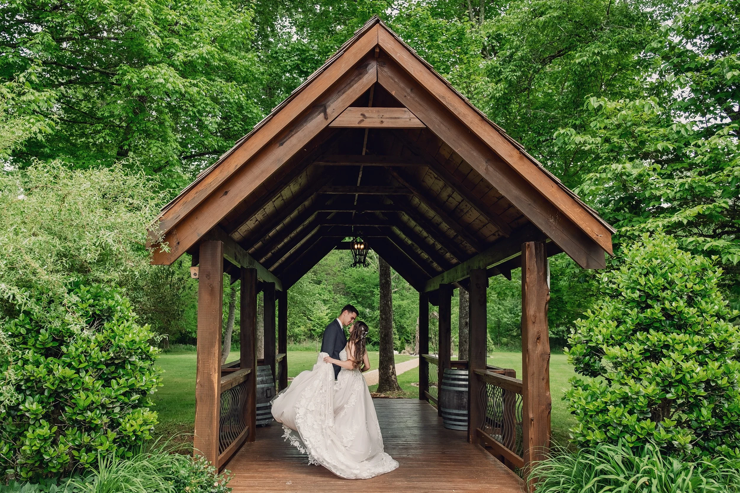 kiss-under-covered-bridge-aprile-wedding.jpg