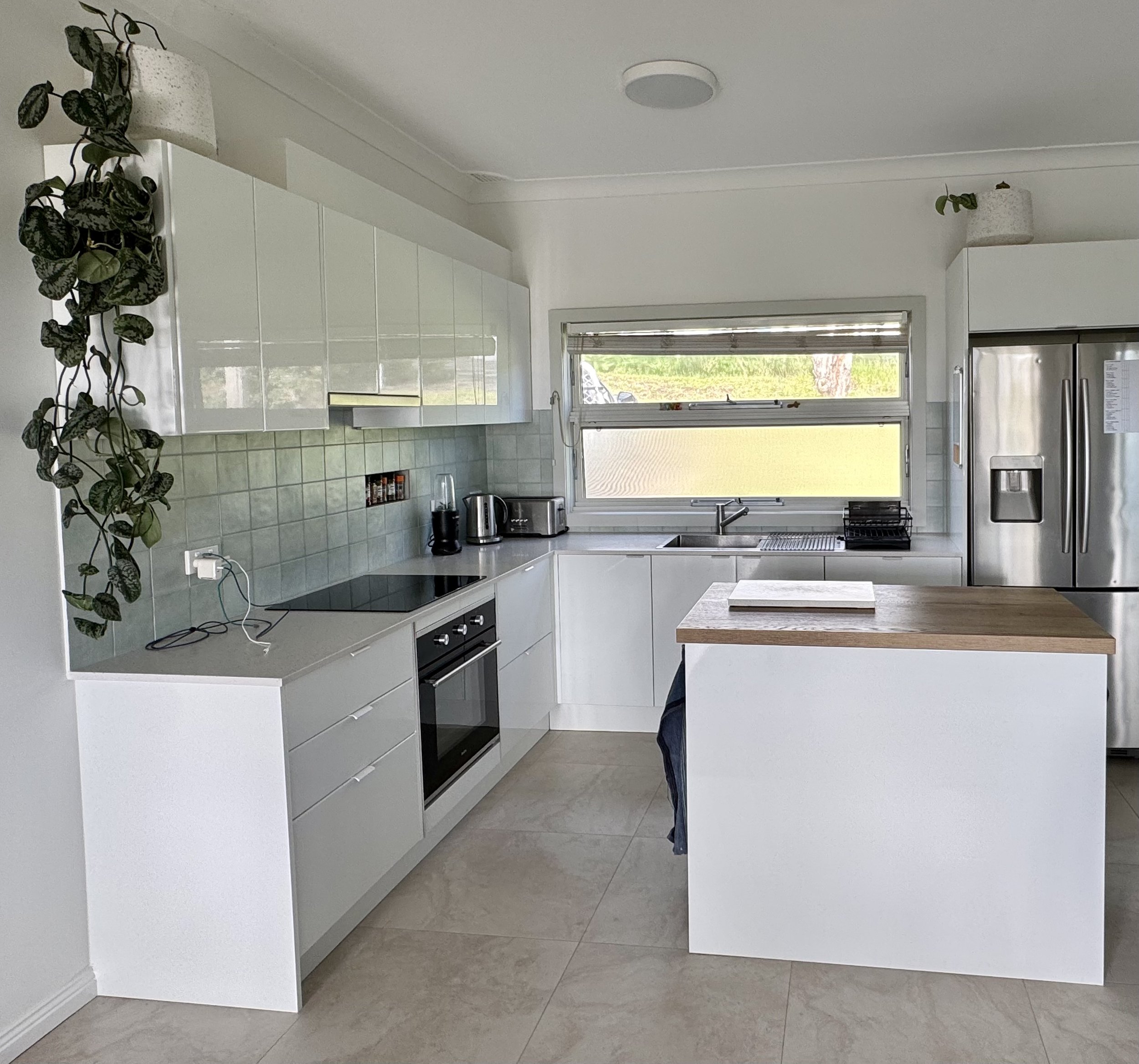 Clean, professional wall and ceiling painting for a Lake Haven property.
