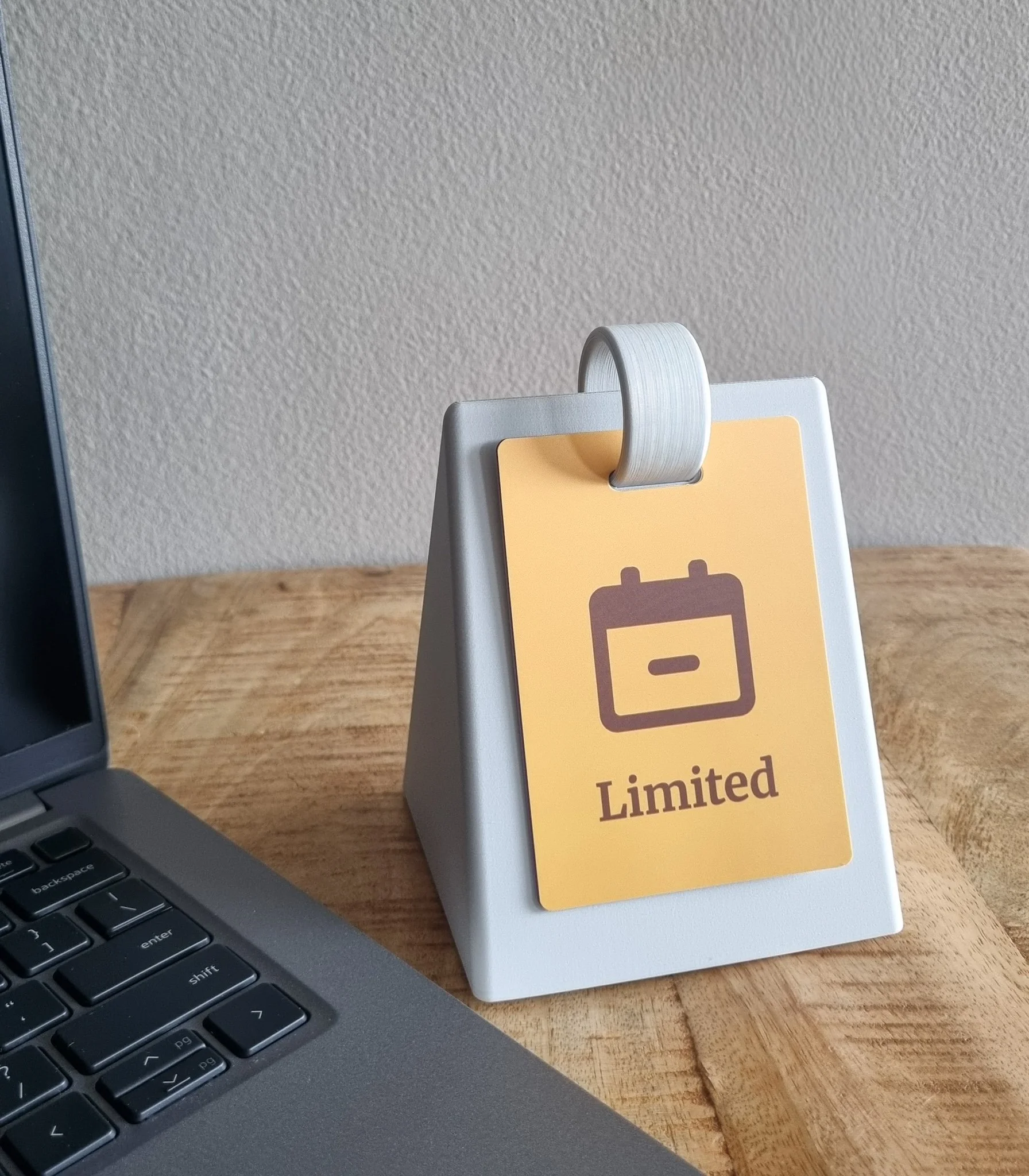 SocialFlip Limited status card on an office desk.