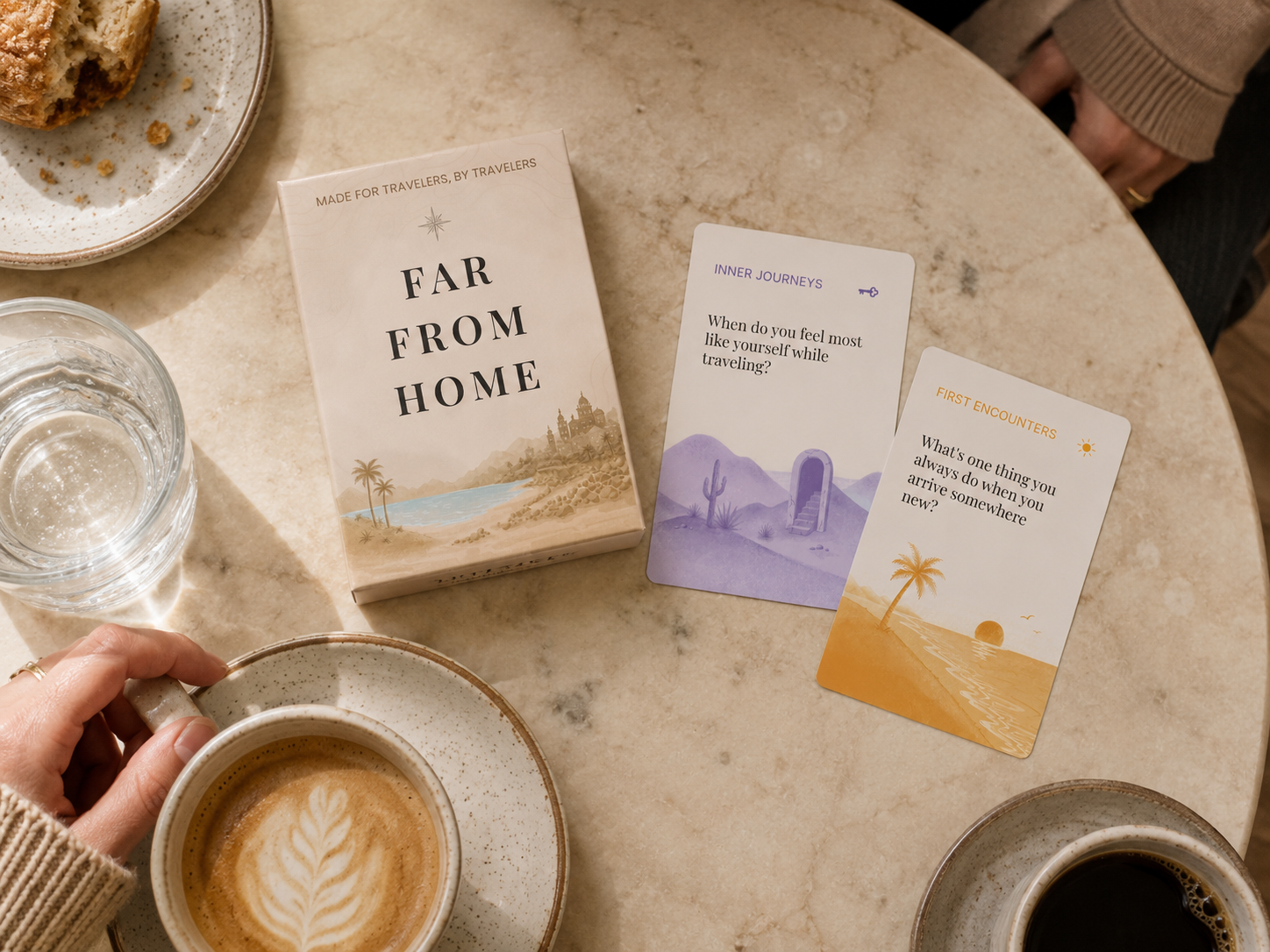 far from home card deck on a table with coffee and pastries around