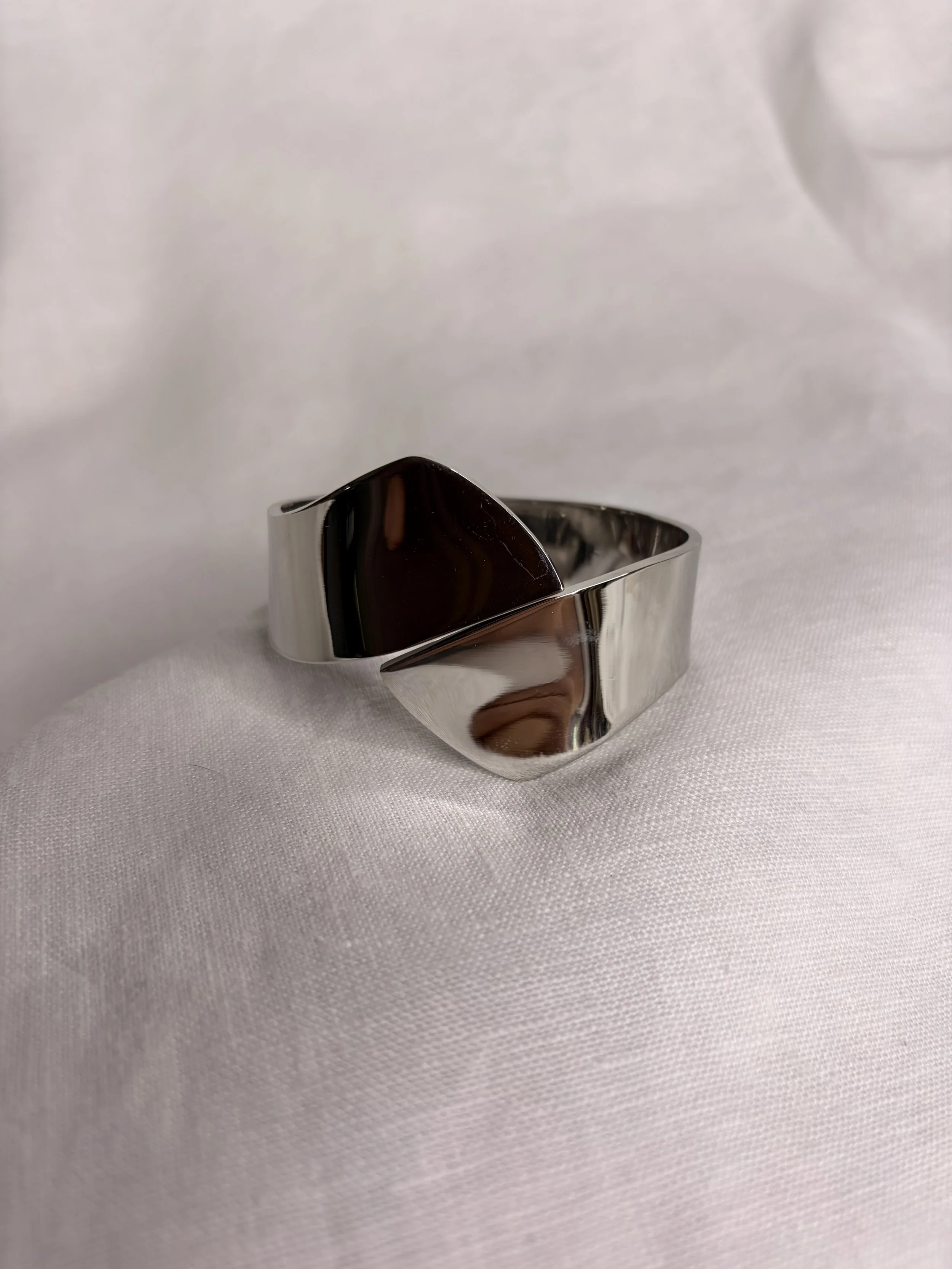 Sleek Twist Silver Bracelet