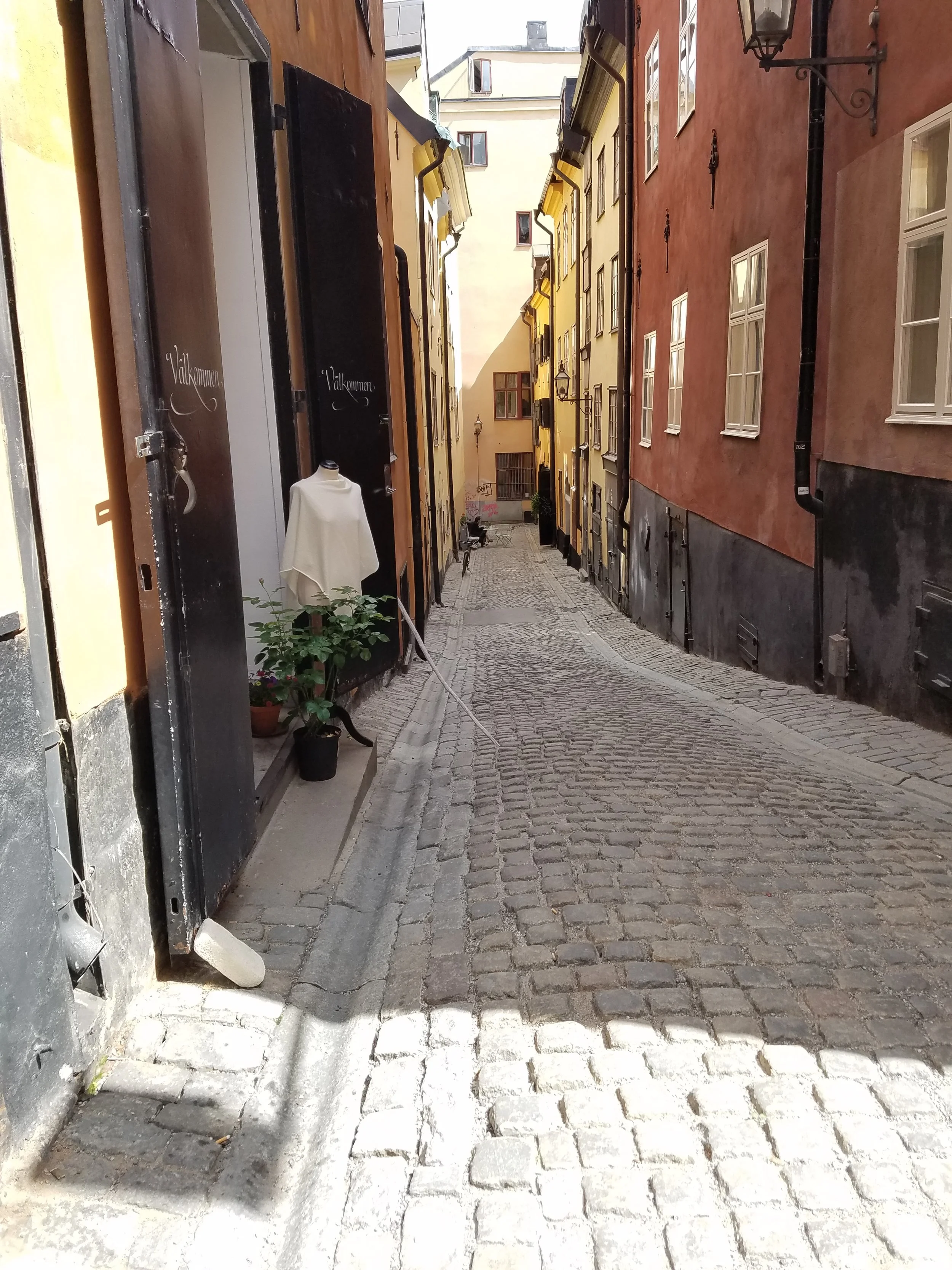 Narrow alley with cobblestone streets in Sweden