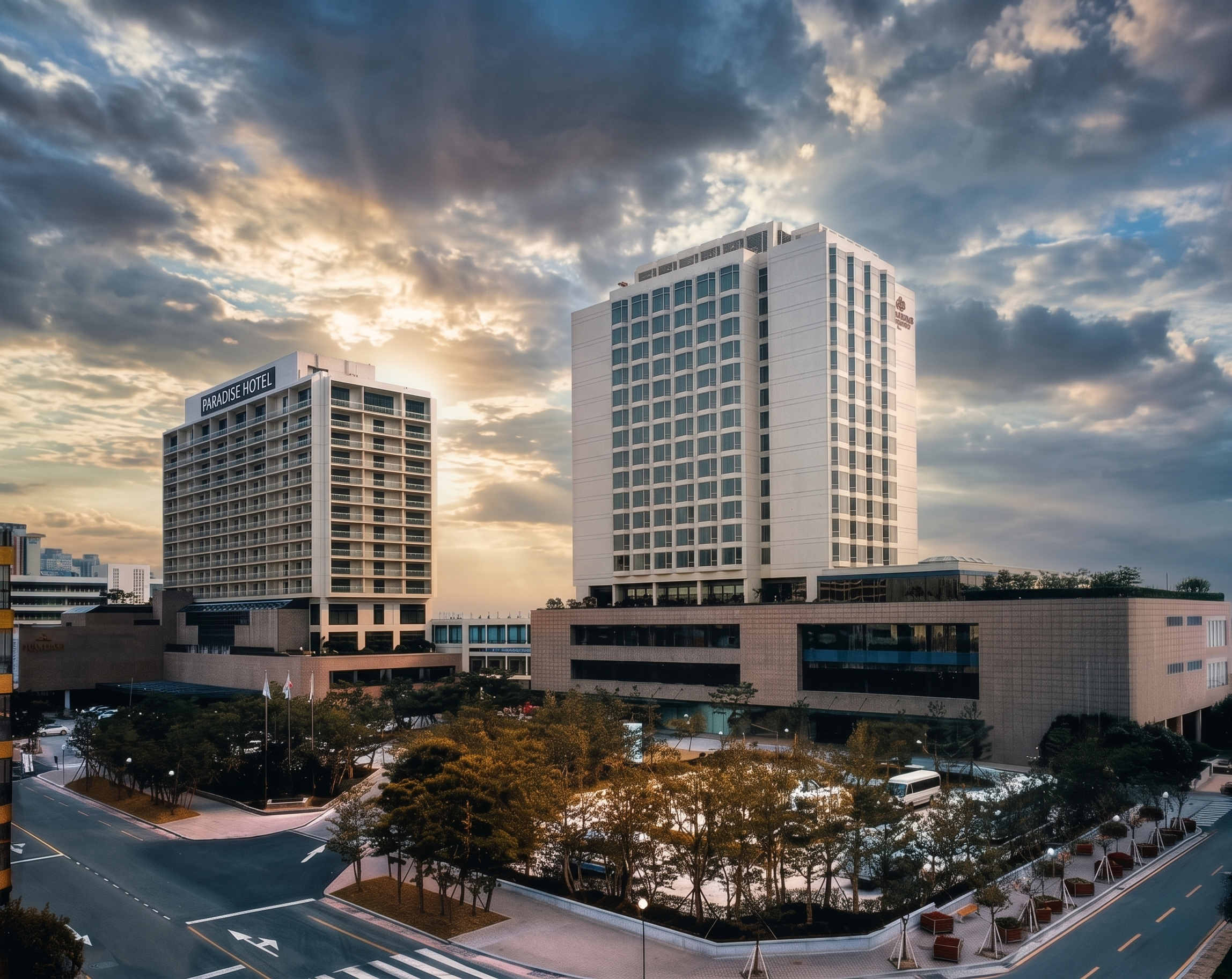 paradise-hotel-busan-grand-aerial-two-tower-exterior-sunset-city-01.png
