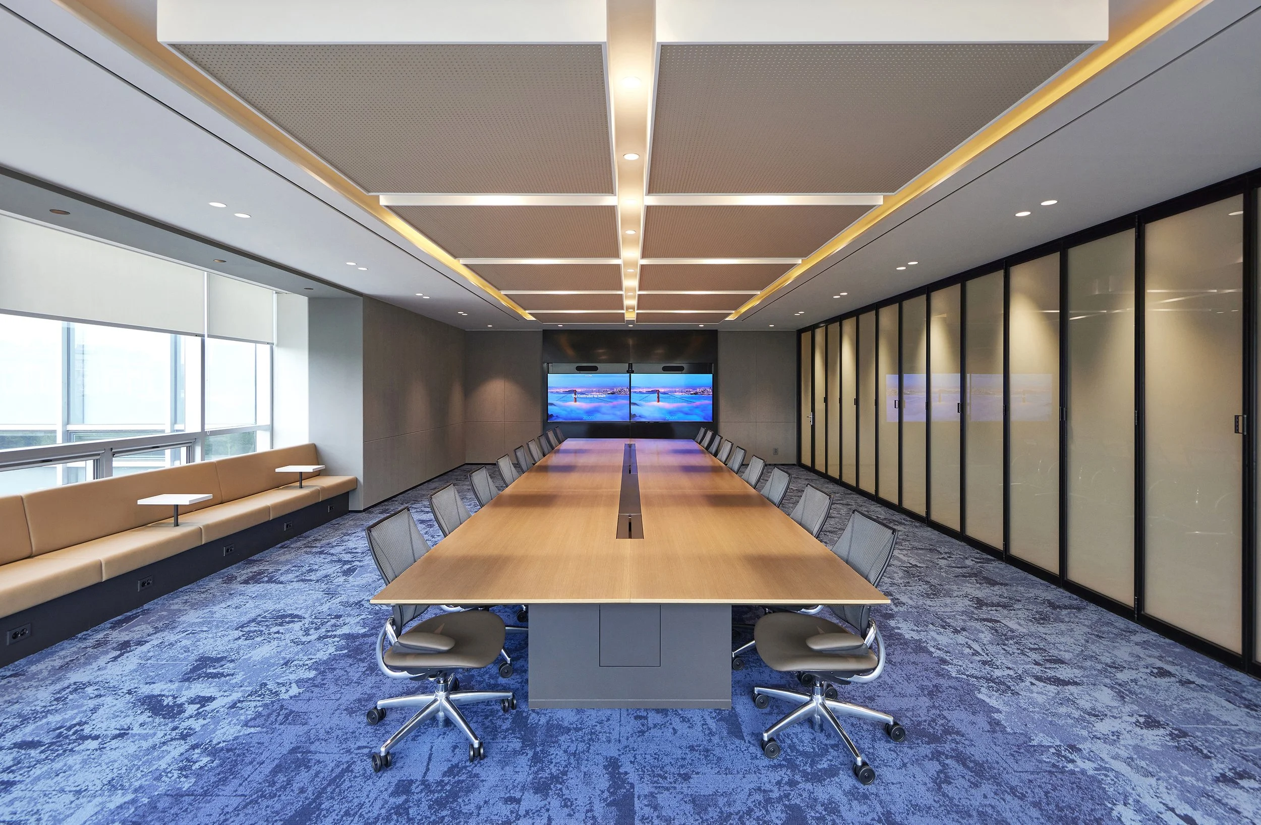 office-interior-boardroom-ambient-wood-blue-carpet-video-wall-01.jpg
