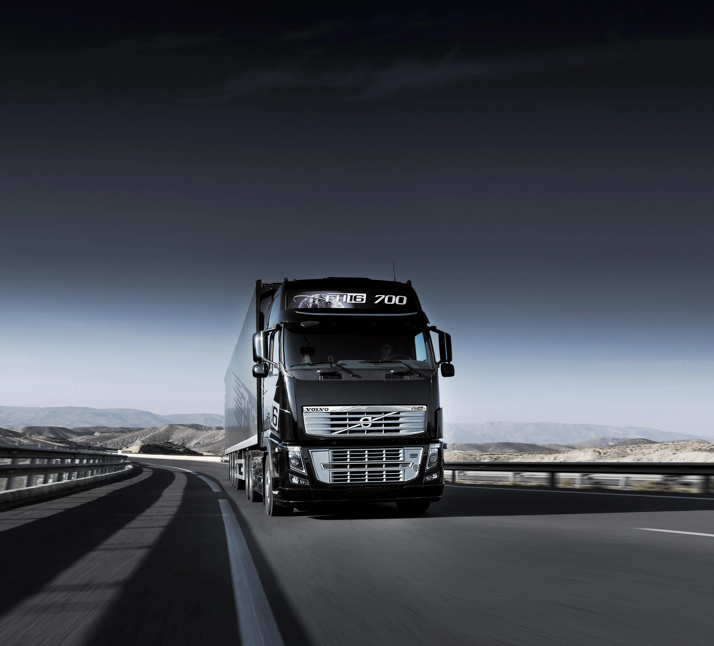 volvo-fh16-700-leaflet-driving-front-desert-highway-black-01.jpg