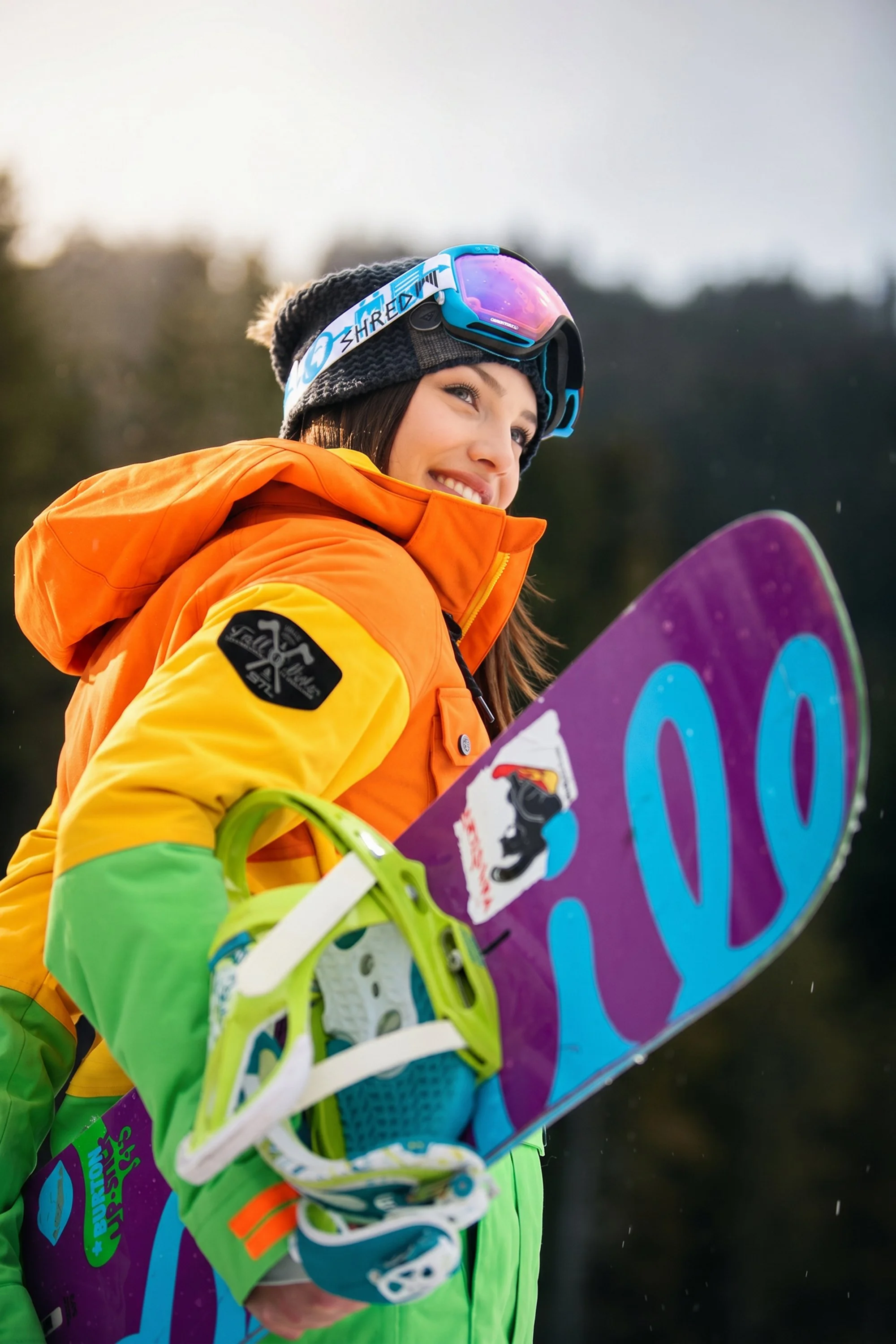 snowboard-jacket-lifestyle-female-orange-yellow-purple-board-shred-goggles-06.jpg