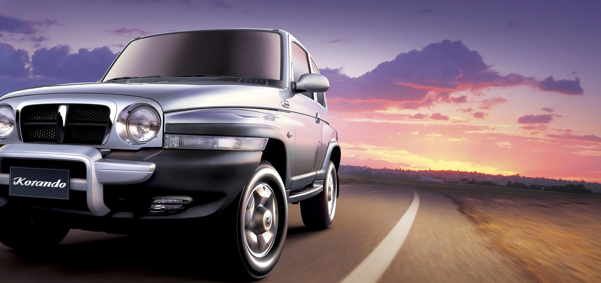 ssangyong-korando-2005-driving-front-sunset-silver-01.jpg