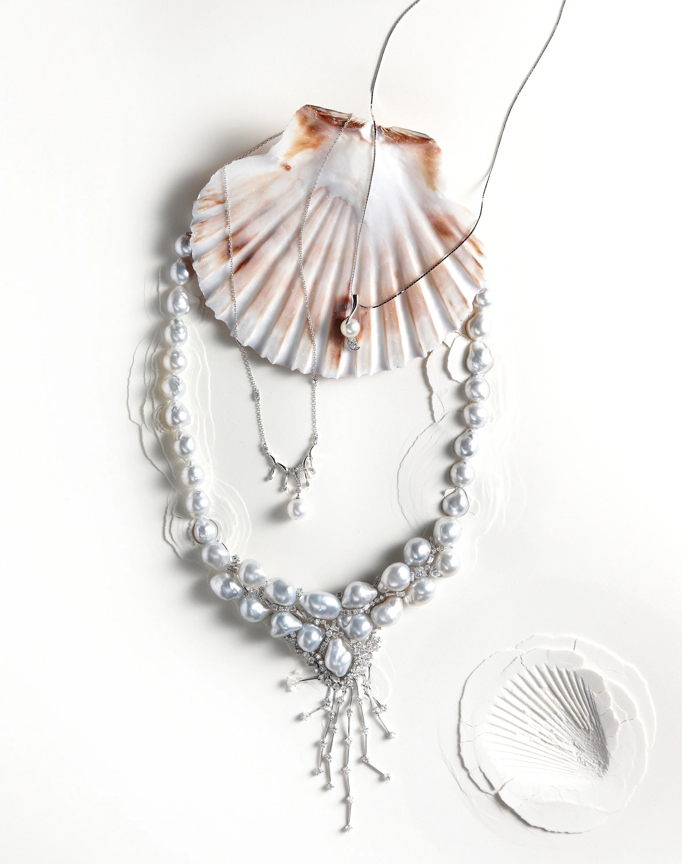 pearl-necklace-collection-scallop-shell-overhead-white-bg-01.jpg