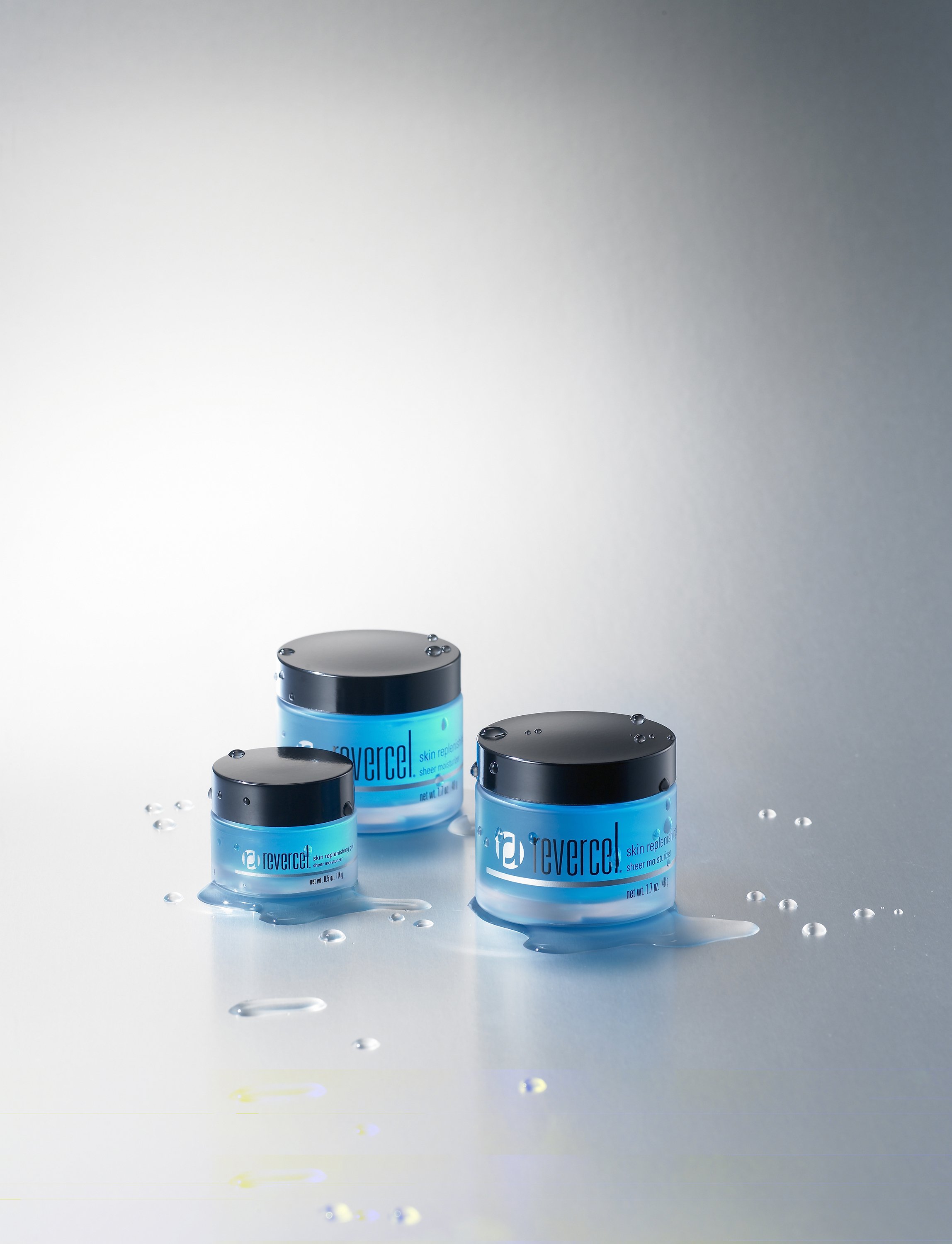 revercel-skin-replenishing-moisturizer-trio-editorial-three-quarter-blue-water-01.jpg