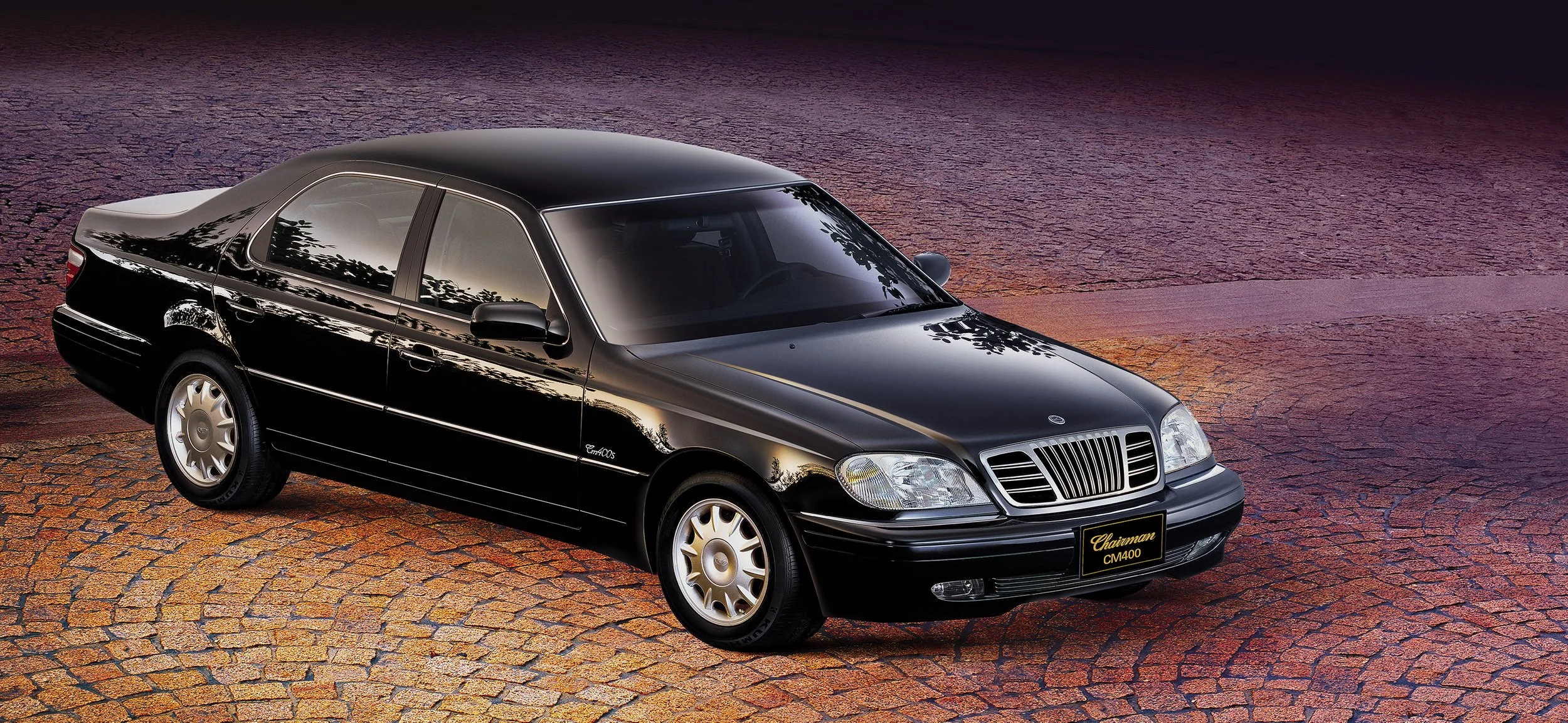 ssangyong-chairman-cm400-studio-front-quarter-black-cobblestone-01.jpg