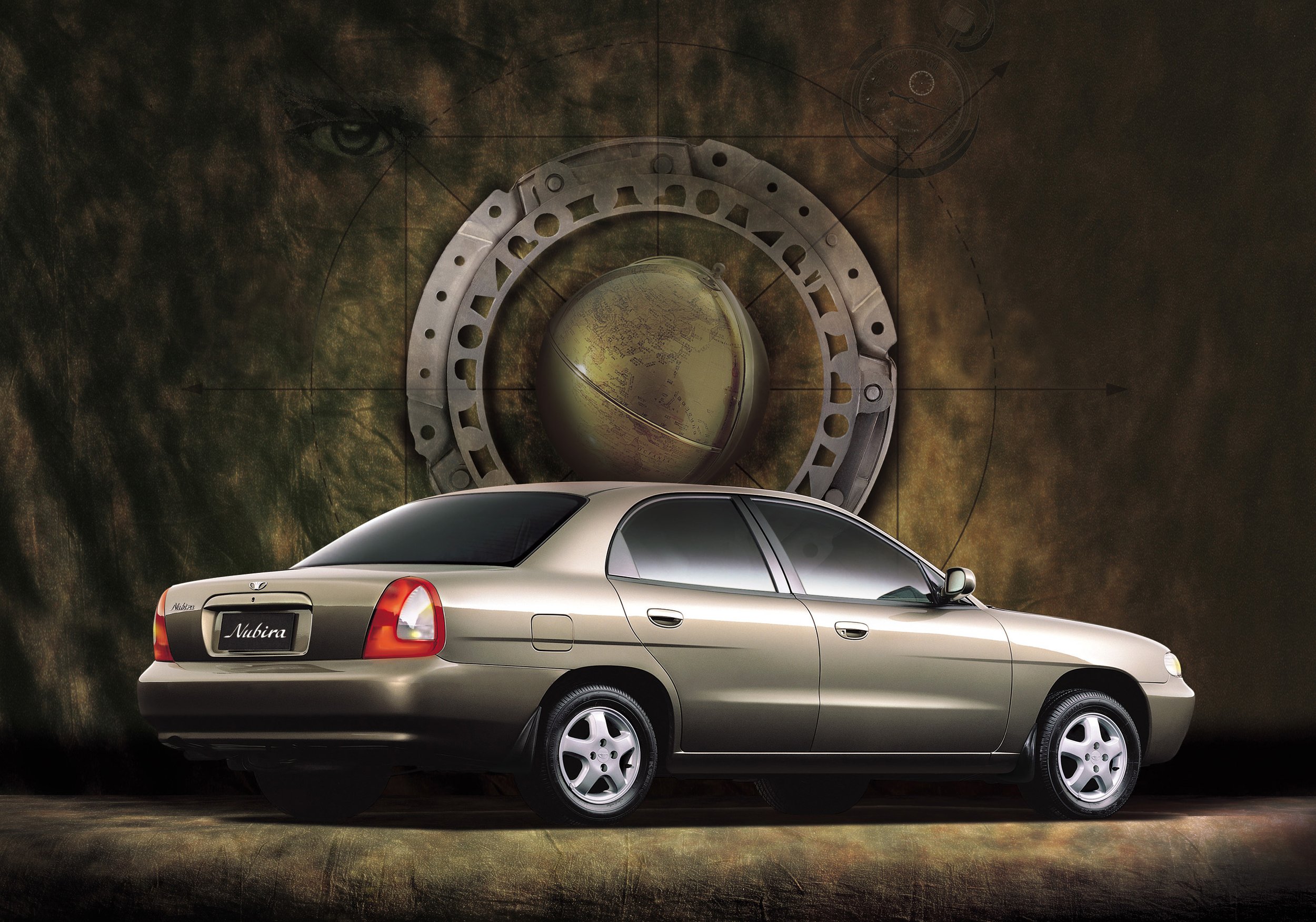 daewoo-nubira-2000s-studio-rear-quarter-gold-dark-bg-01.jpg