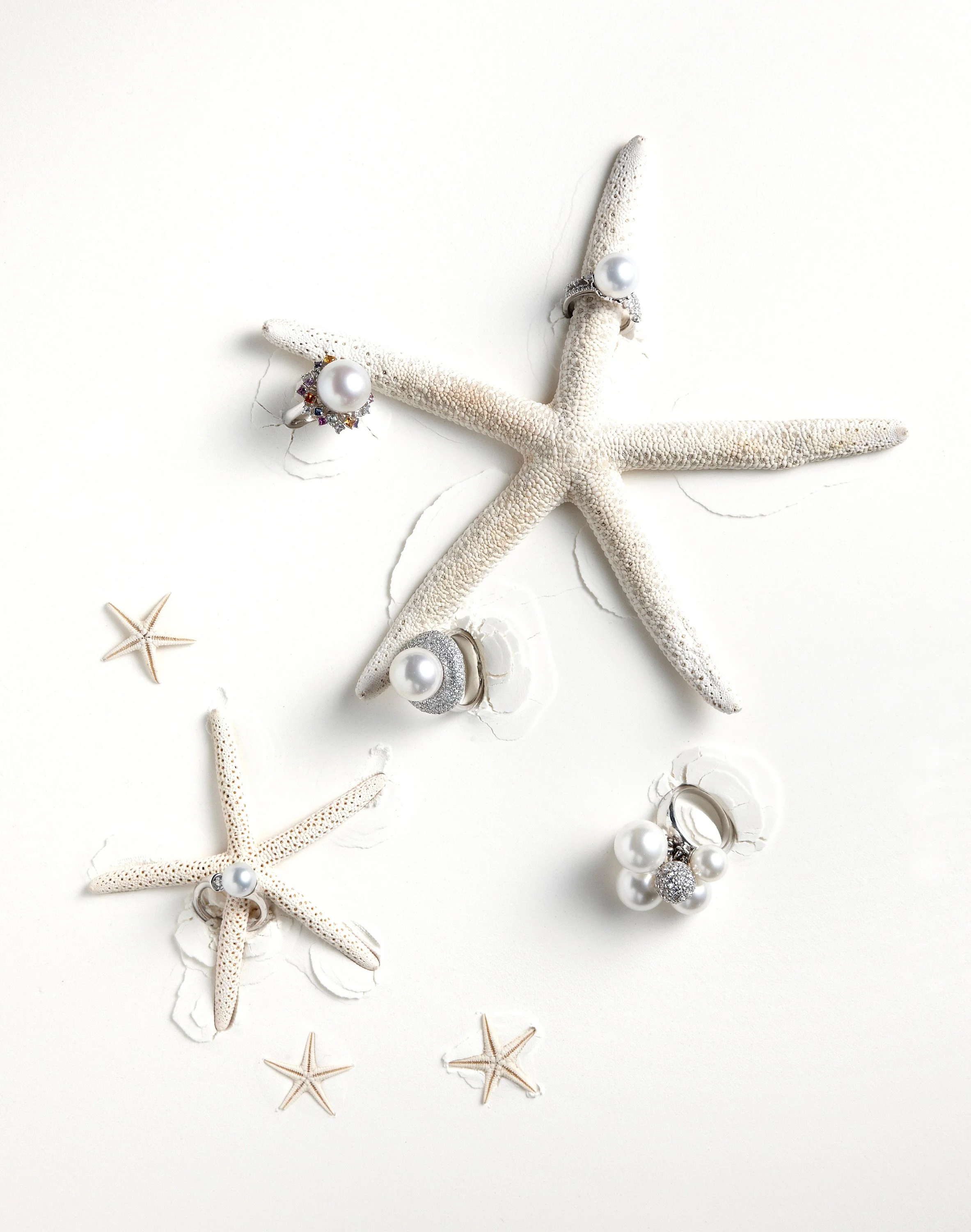 pearl-ring-collection-starfish-overhead-white-bg-01.jpg