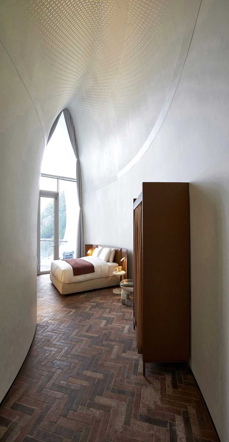 ulleungdo-resort-villa-interior-bedroom-ambient-white-brown-brick-herringbone-04.jpg