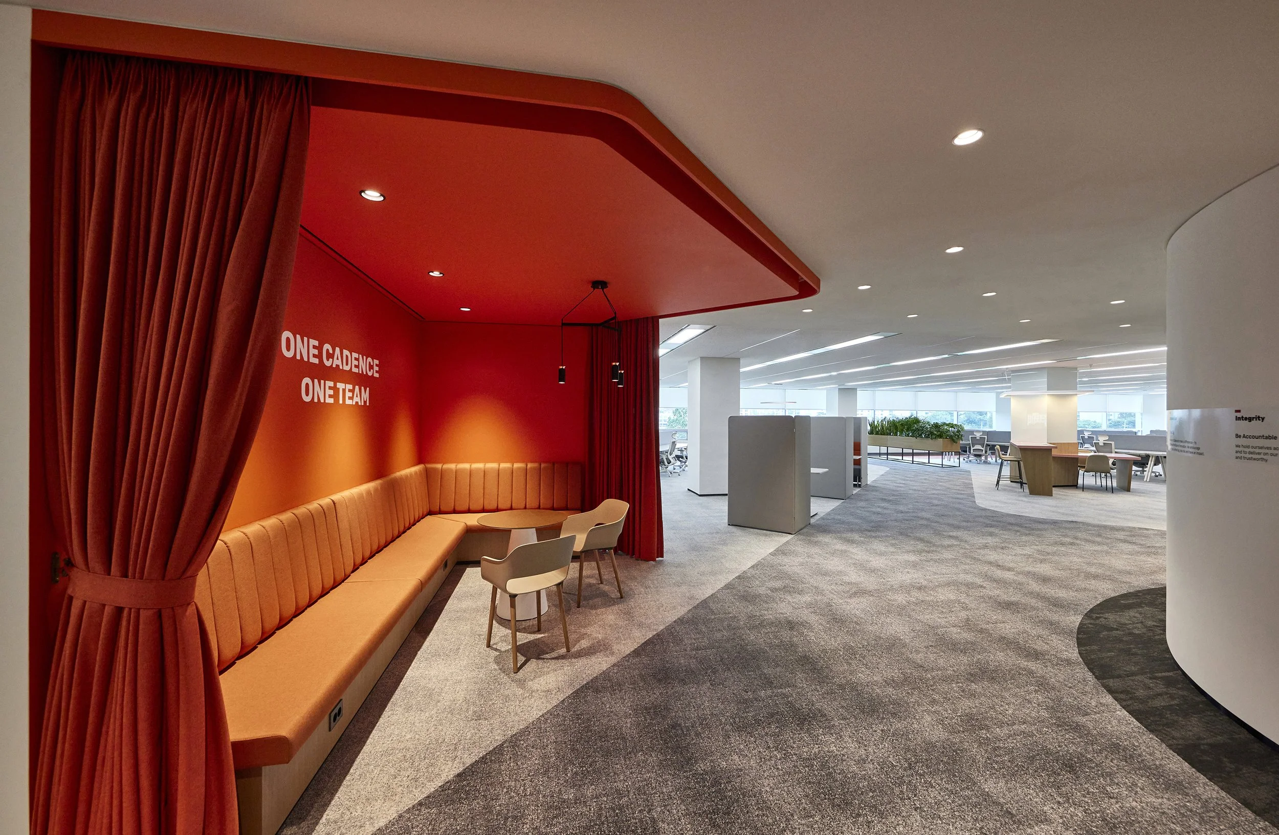 office-interior-collaboration-zone-ambient-red-orange-banquette-open-plan-01.jpg