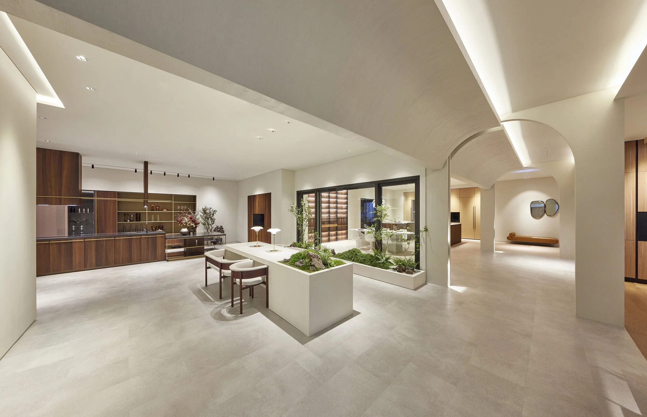 kitchen-showroom-interior-open-plan-ambient-white-wood-arch-indoor-garden-01.jpg