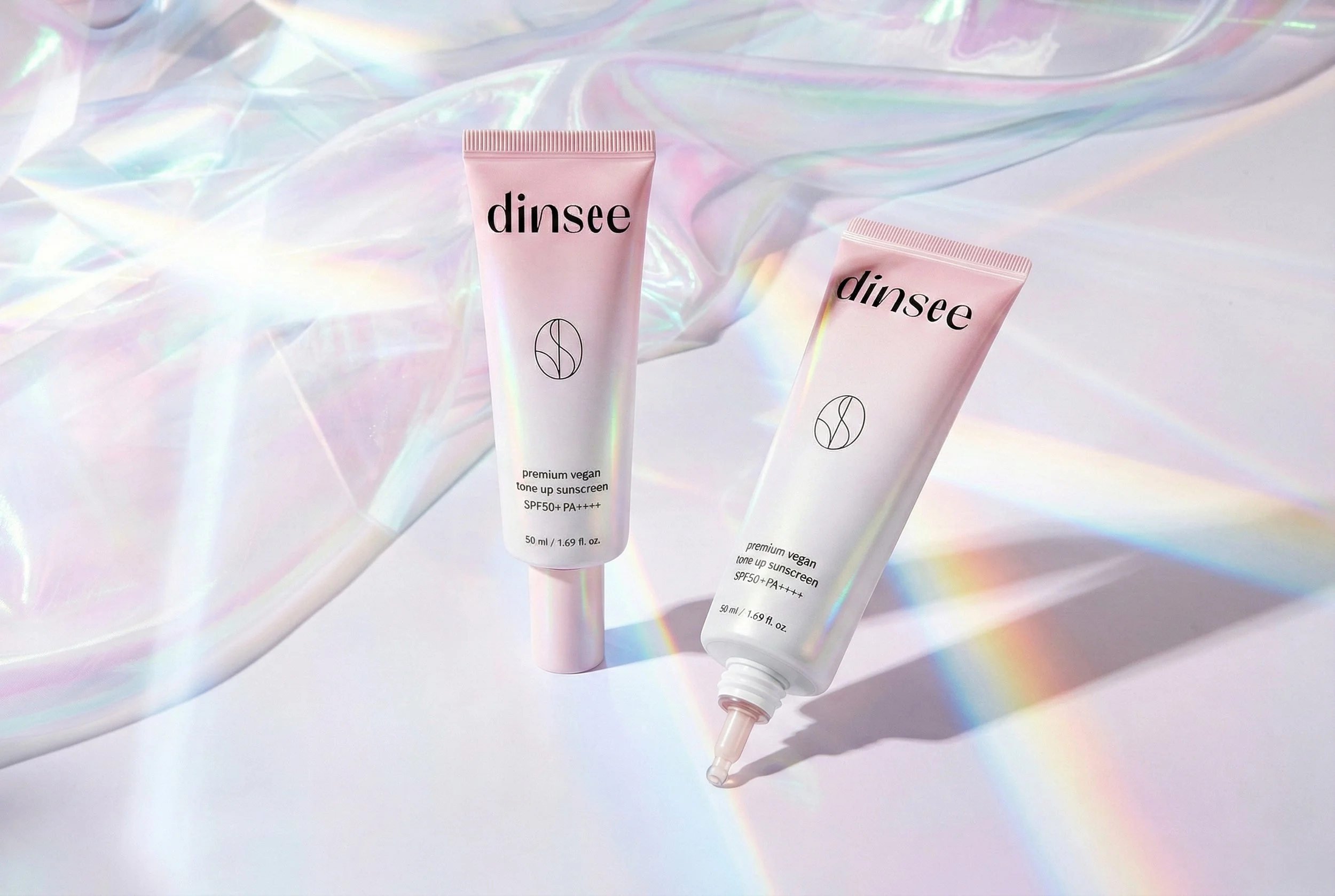 dinsee-vegan-tone-up-sunscreen-spf50-product-duo-holographic-pink-01.jpg