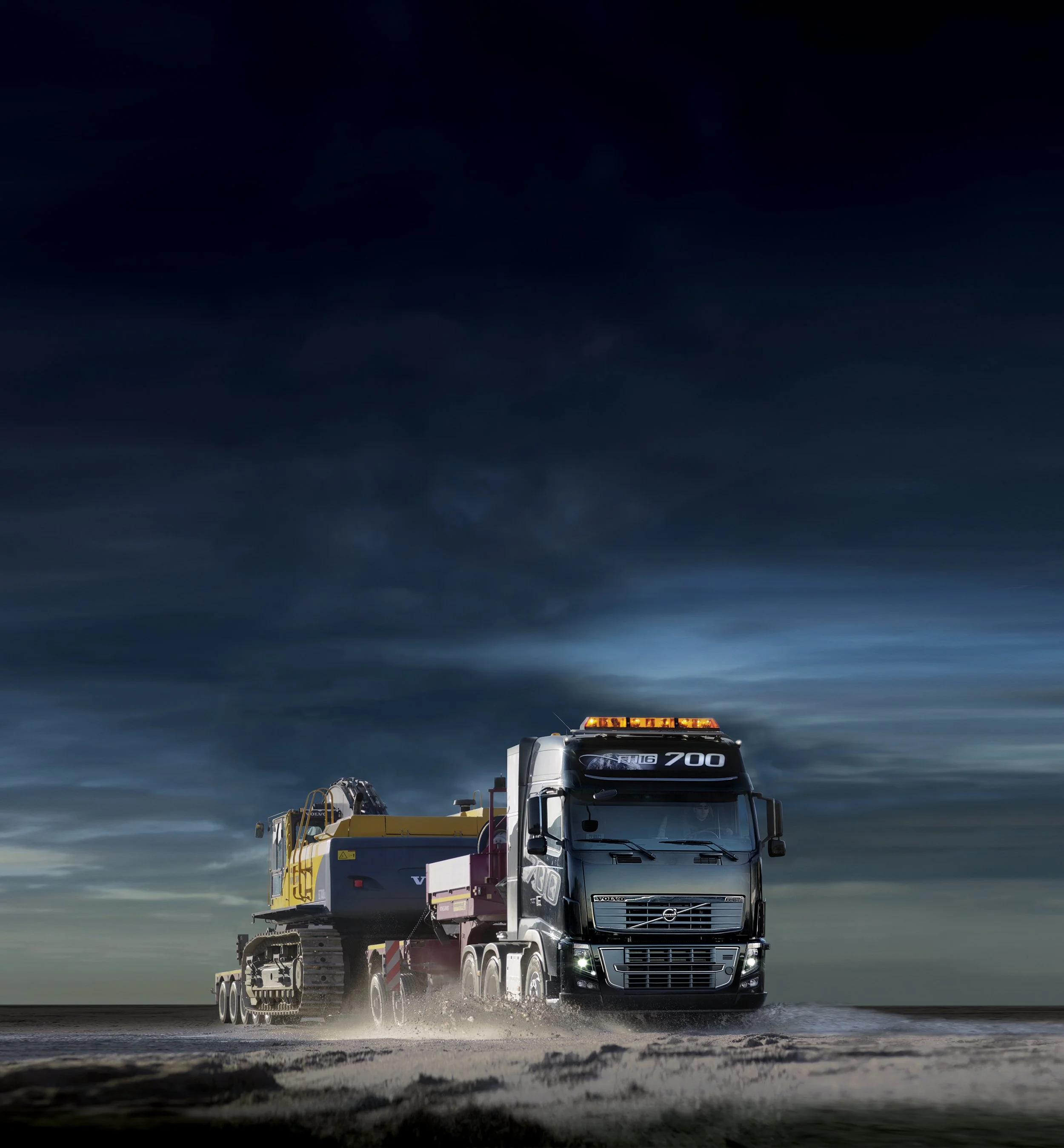 volvo-fh16-700-leaflet-driving-front-heavy-haul-excavator-night-01.jpg