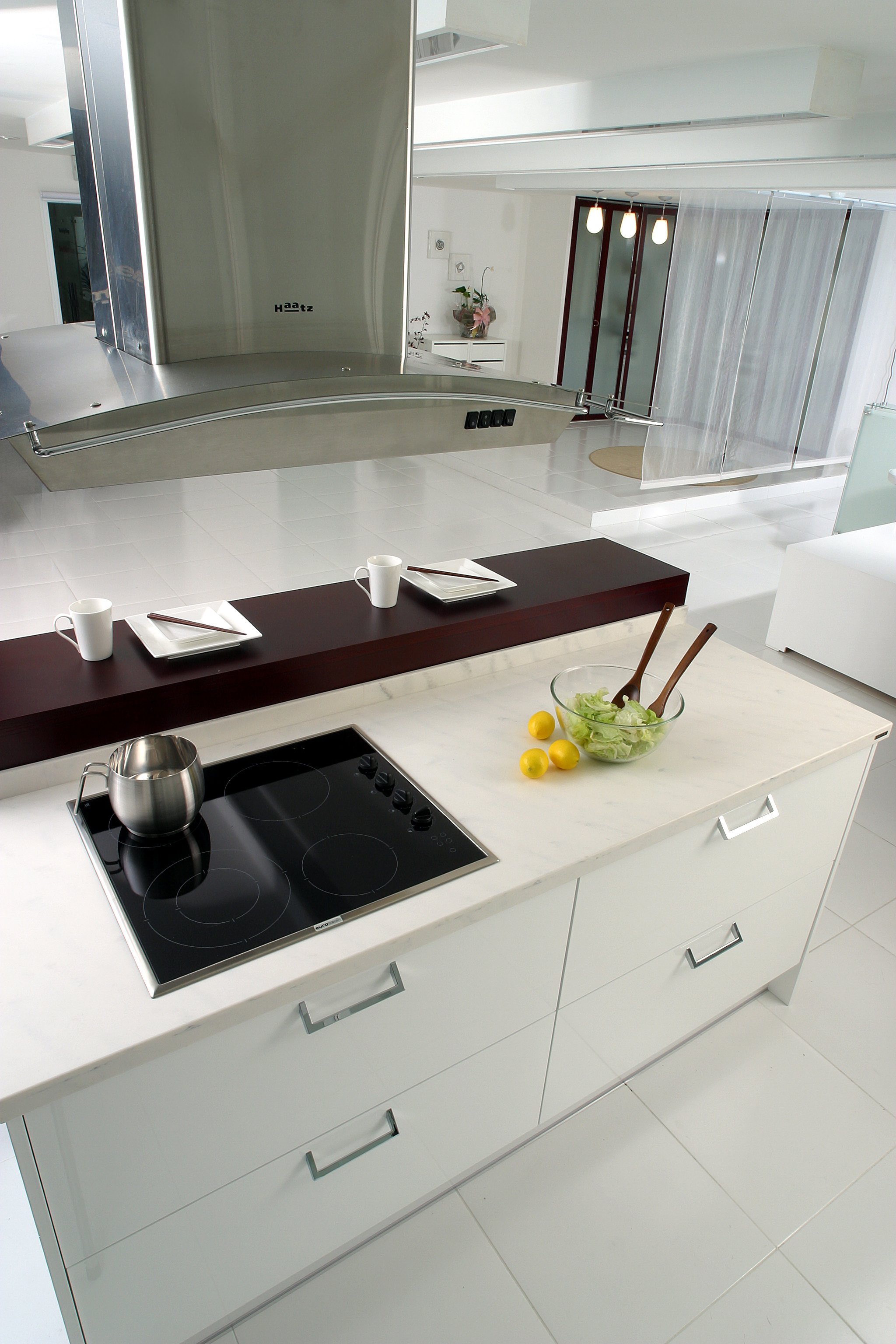 deau-kitchen-island-cooktop-range-hood-dark-red-countertop-overhead-perspective-01.jpg