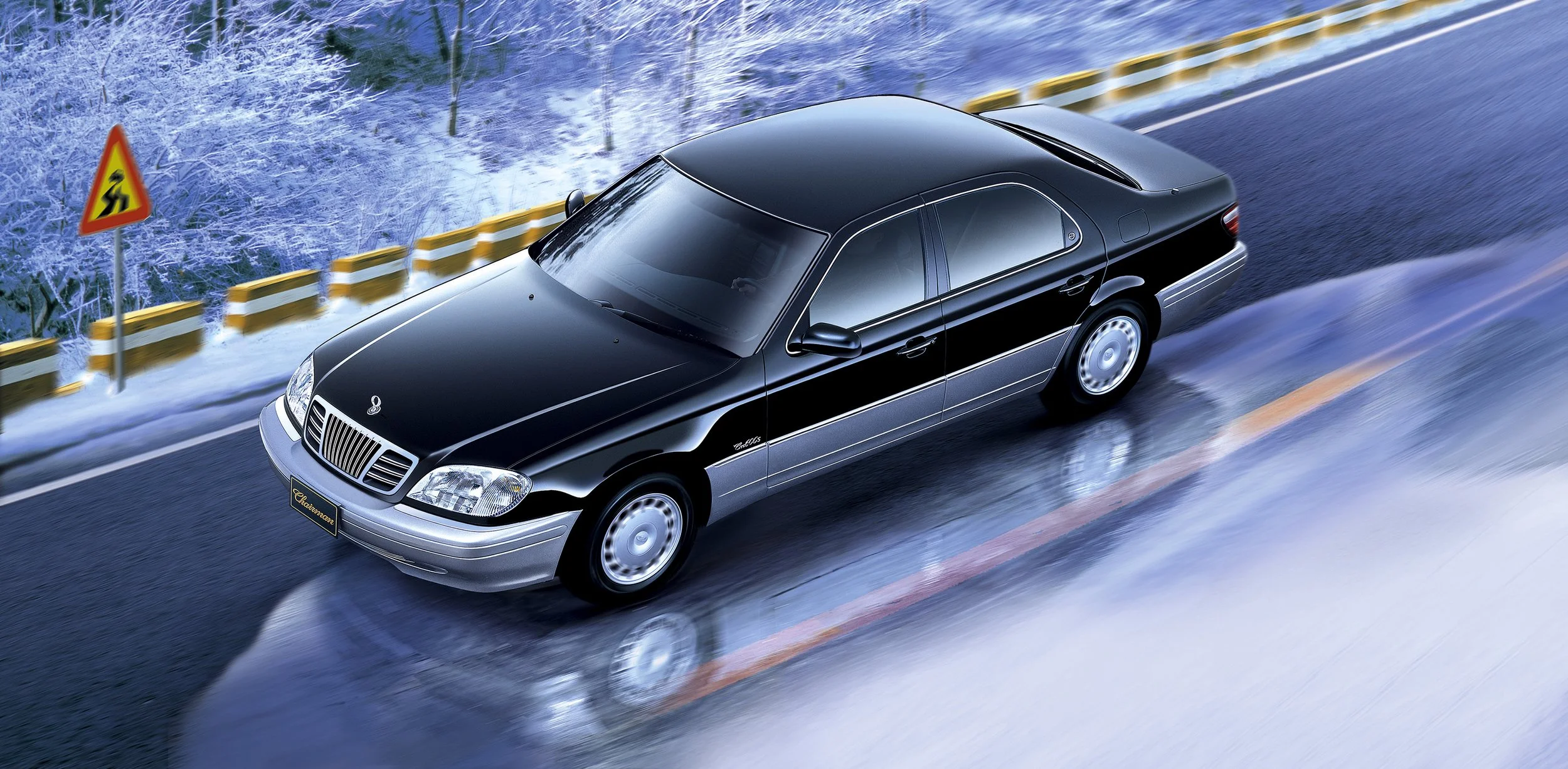 ssangyong-chairman-2000s-driving-high-angle-black-winter-01.jpg