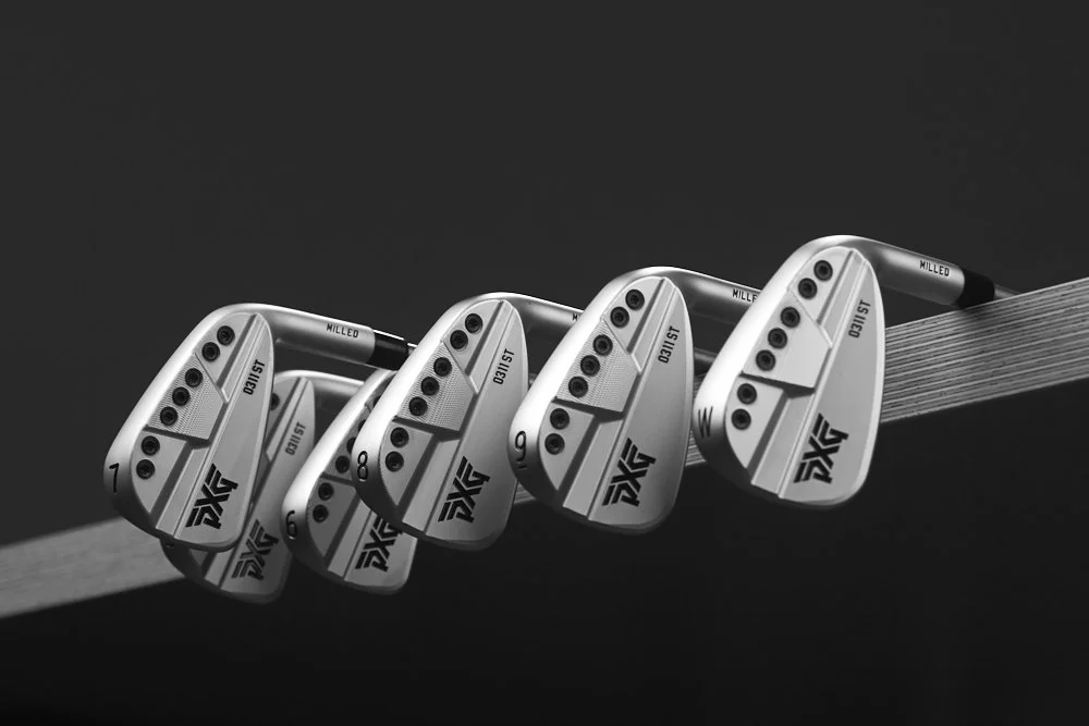 pxg-0311st-iron-set-bar-suspended-dramatic-angle-black-bg-01.jpg