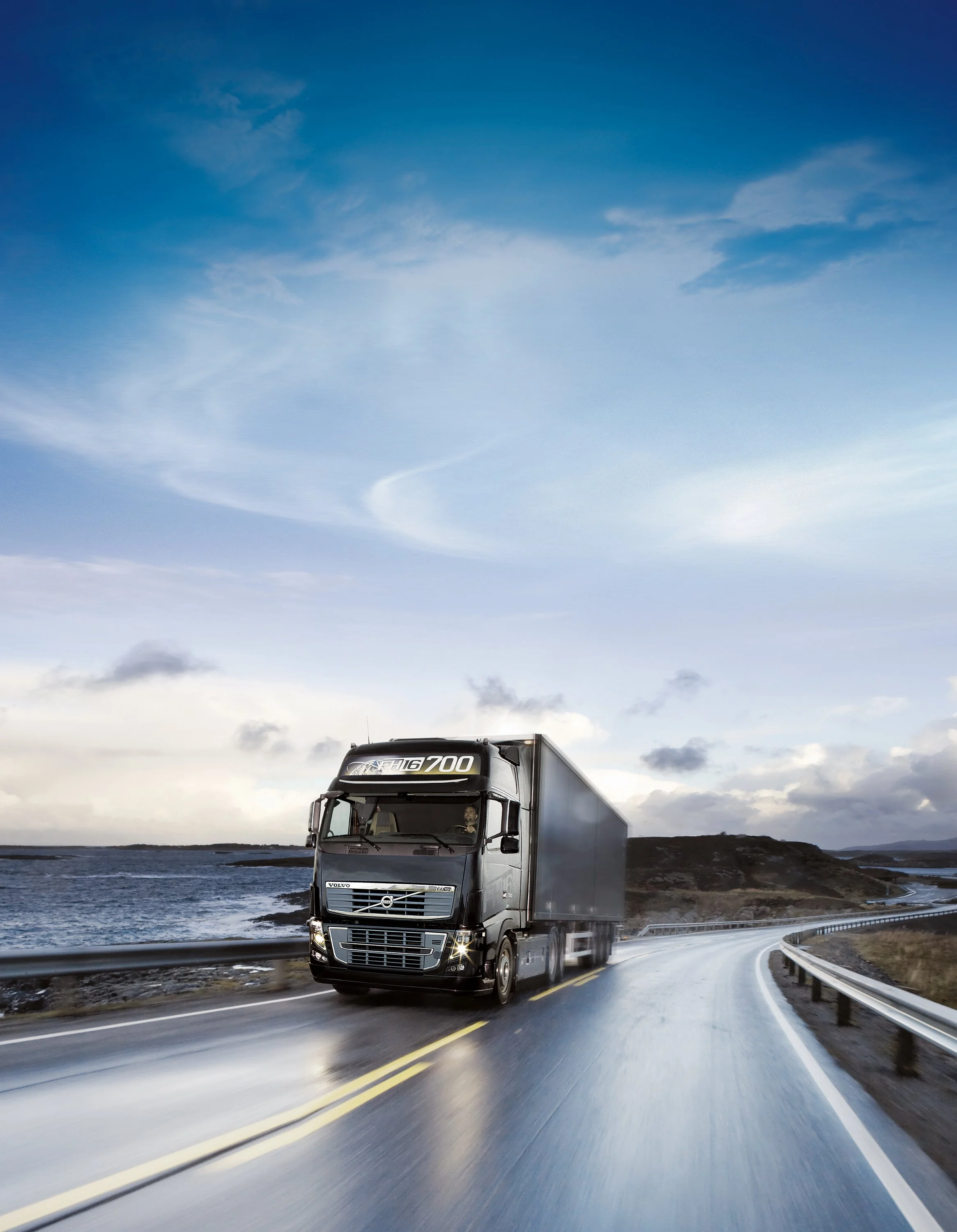 volvo-fh16-700-leaflet-driving-front-coastal-road-black-01.jpg