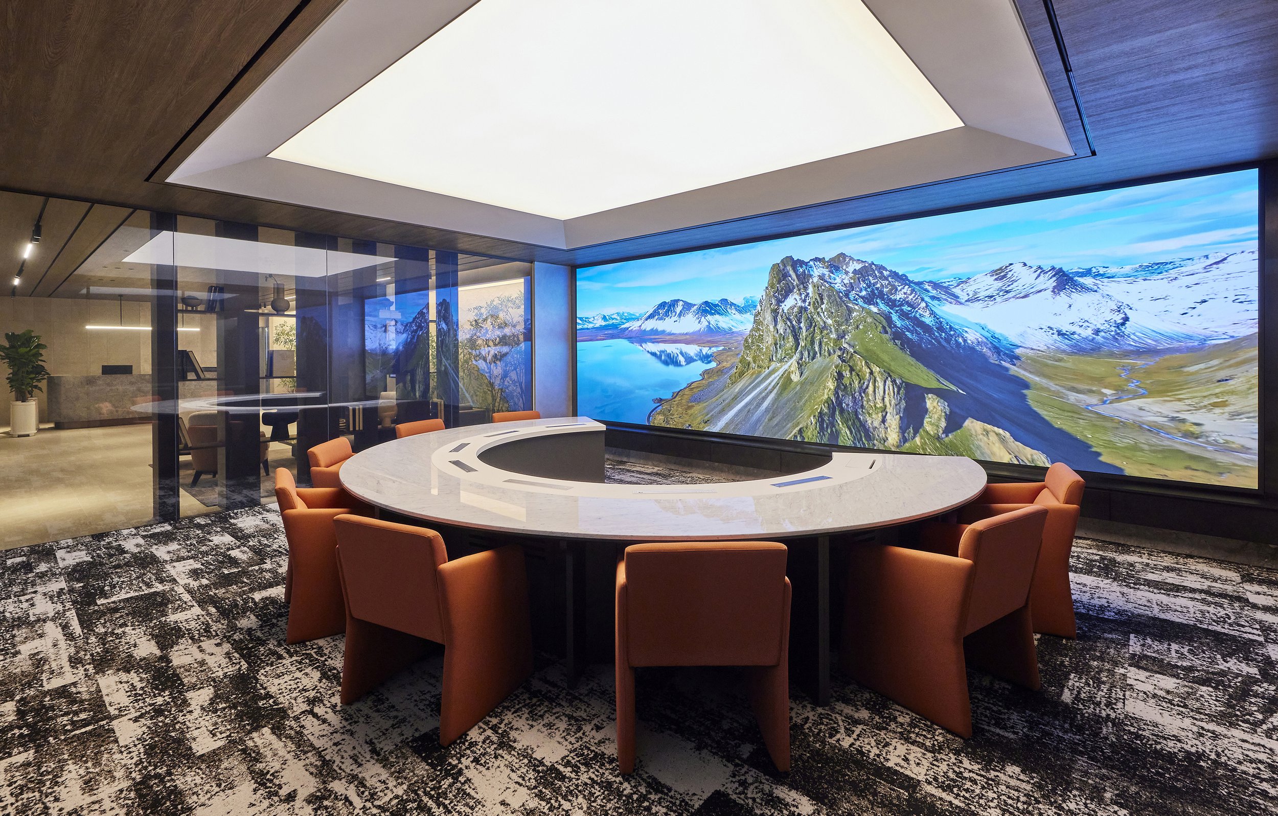 office-interior-meeting-room-round-table-ambient-wood-orange-led-wall-01.jpg