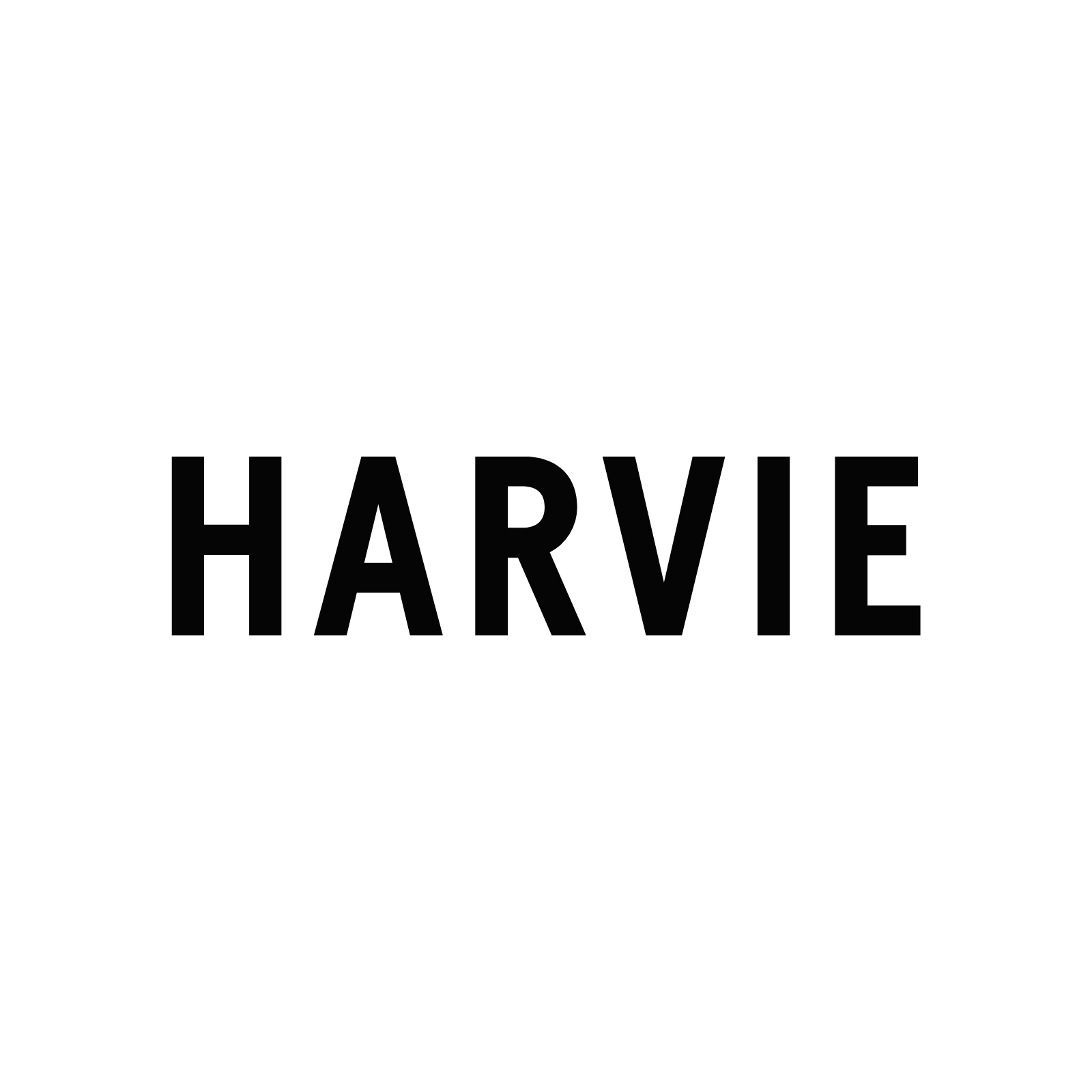Black church window with the words "The Harvest" in dark letters.