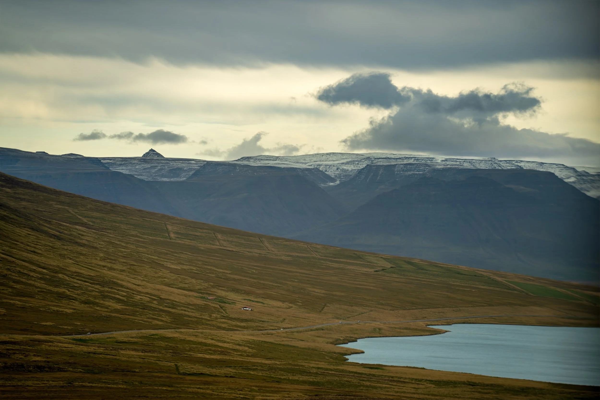 Remote mountain landscape and winding road in northern Iceland