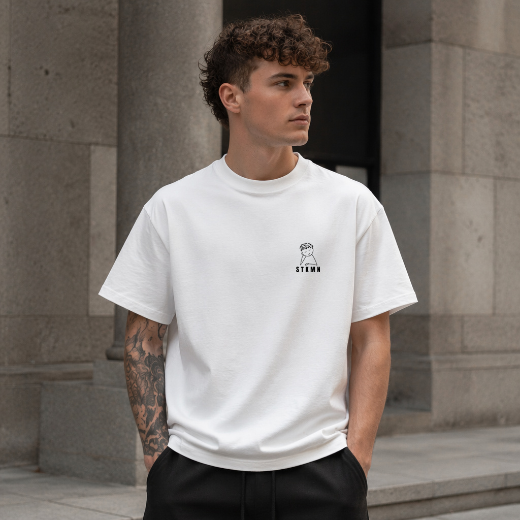 STKMN Essential Tee with boy graphic in white heavyweight organic cotton on model