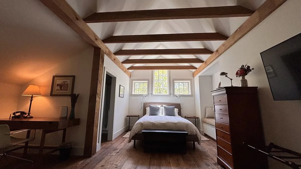 Bedroom with Dedicated Working Space and Full Bathroom in Guest Cottage with Cathedral Beamed Ceilings and Central AC