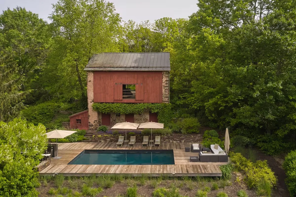 Solid IPE Pool Deck and Antique Stone Milking Barn