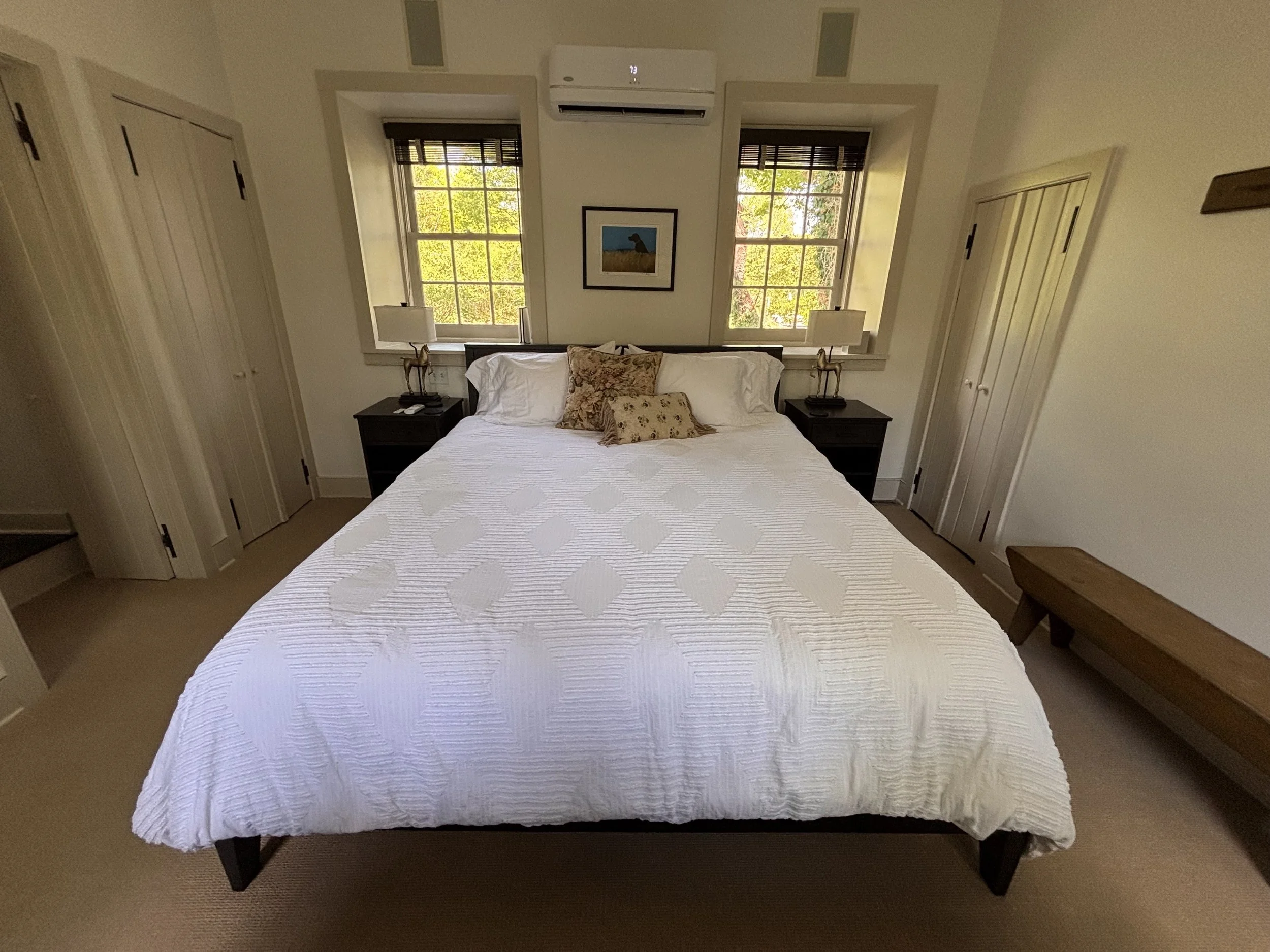 Master Bedroom with Cathedral Ceilings and Exposed Beams with Central AC and a 48-inch TV in Main House