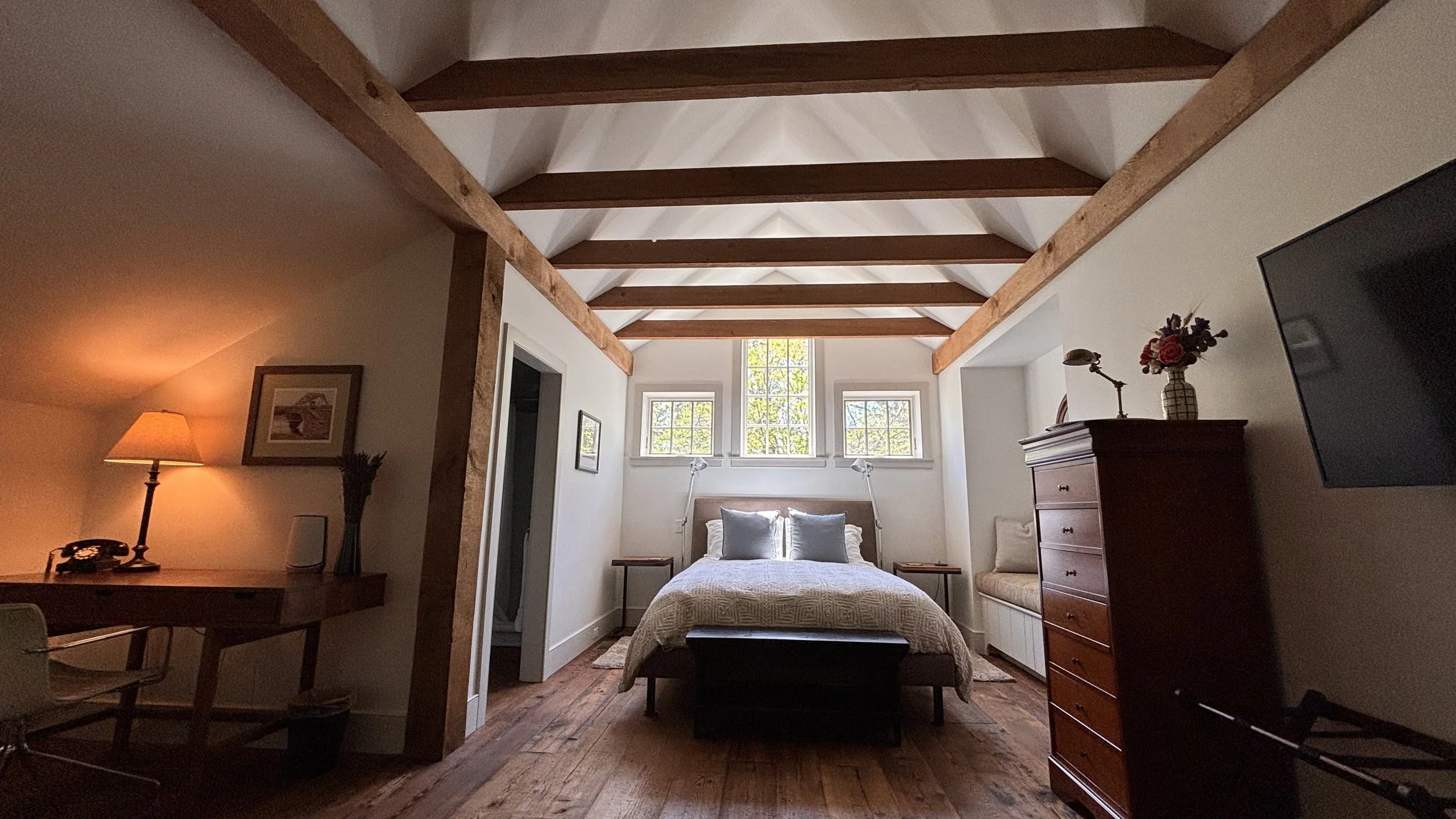 Bedroom with Dedicated Working Space and Full Bathroom in Guest Cottage with Cathedral Beamed Ceilings and Central AC