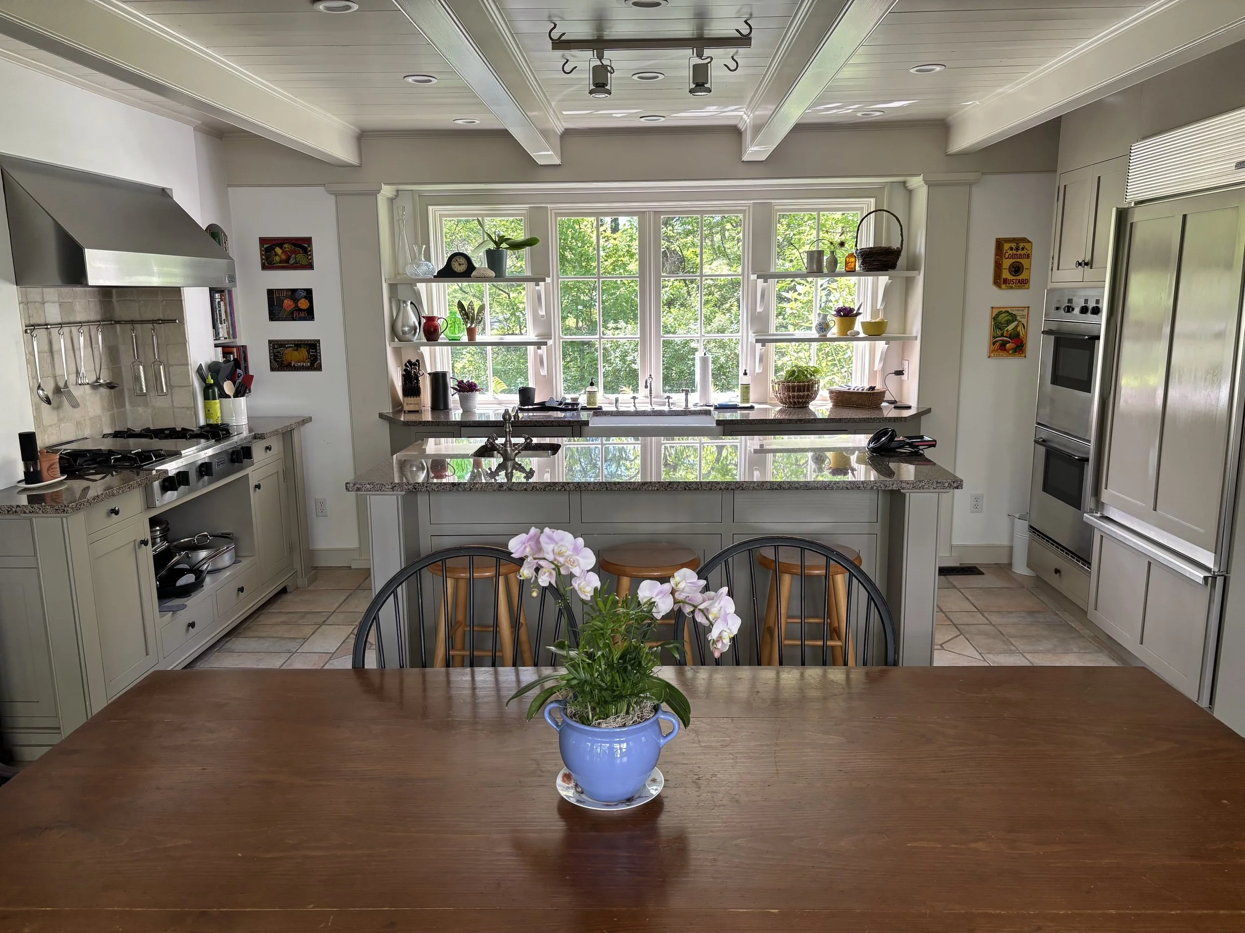 Stunning Eat-In Kitchen with a Granite Island, Seating for 6, Sub-Zero Refrigerator, Thermador Double Oven, and Five Star Range — Ready to Inspire Gourmet Cooking with Fresh Local Ingredients