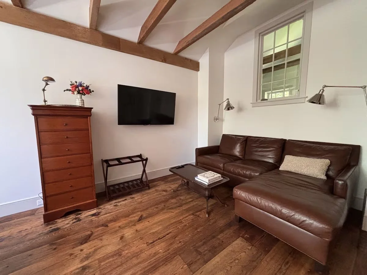 Bedroom with Dedicated Working Space and Full Bathroom in Guest Cottage with Cathedral Beamed Ceilings and Central AC
