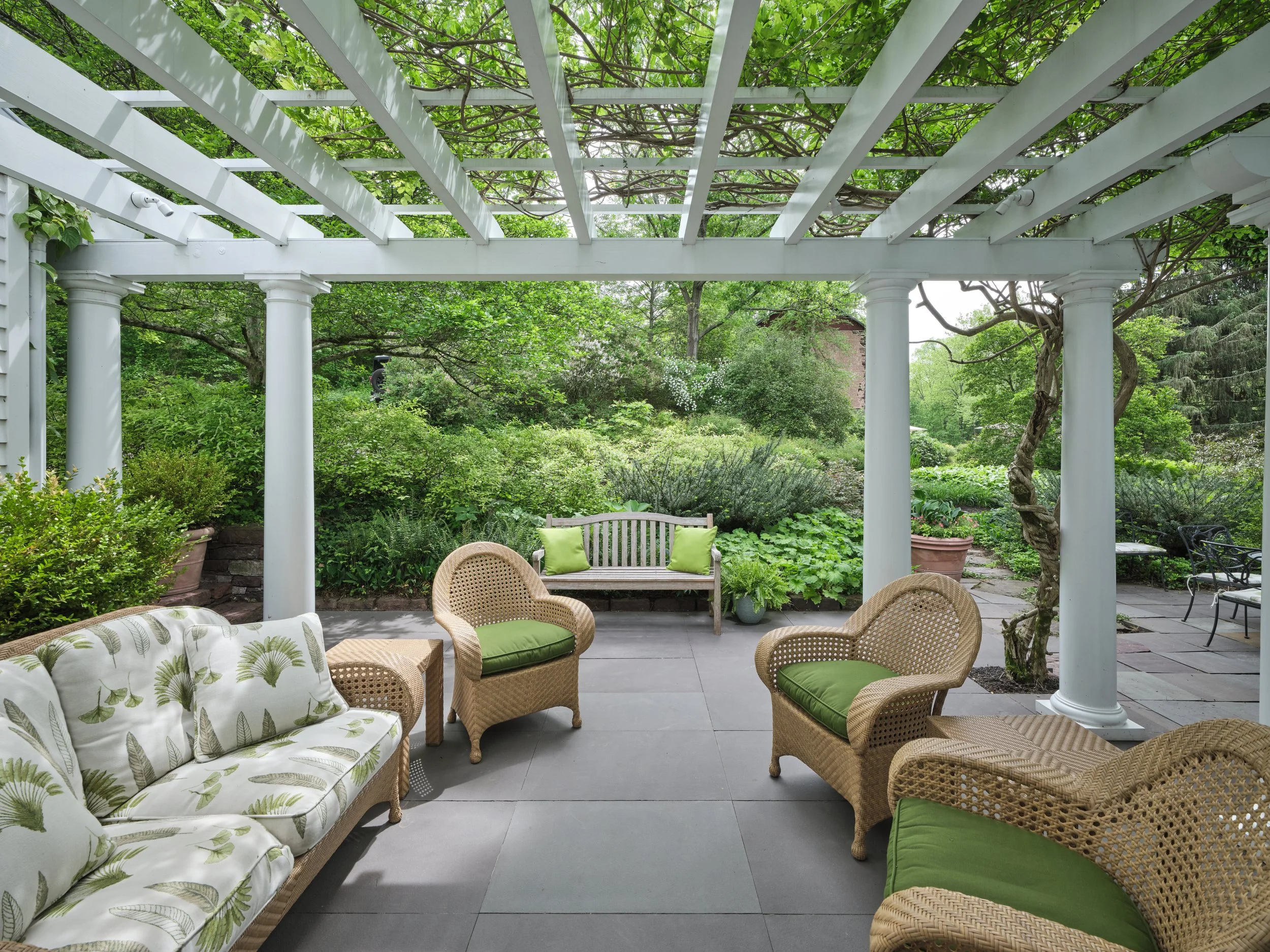 Rear Patio with Wisteria Pergola and Gardens