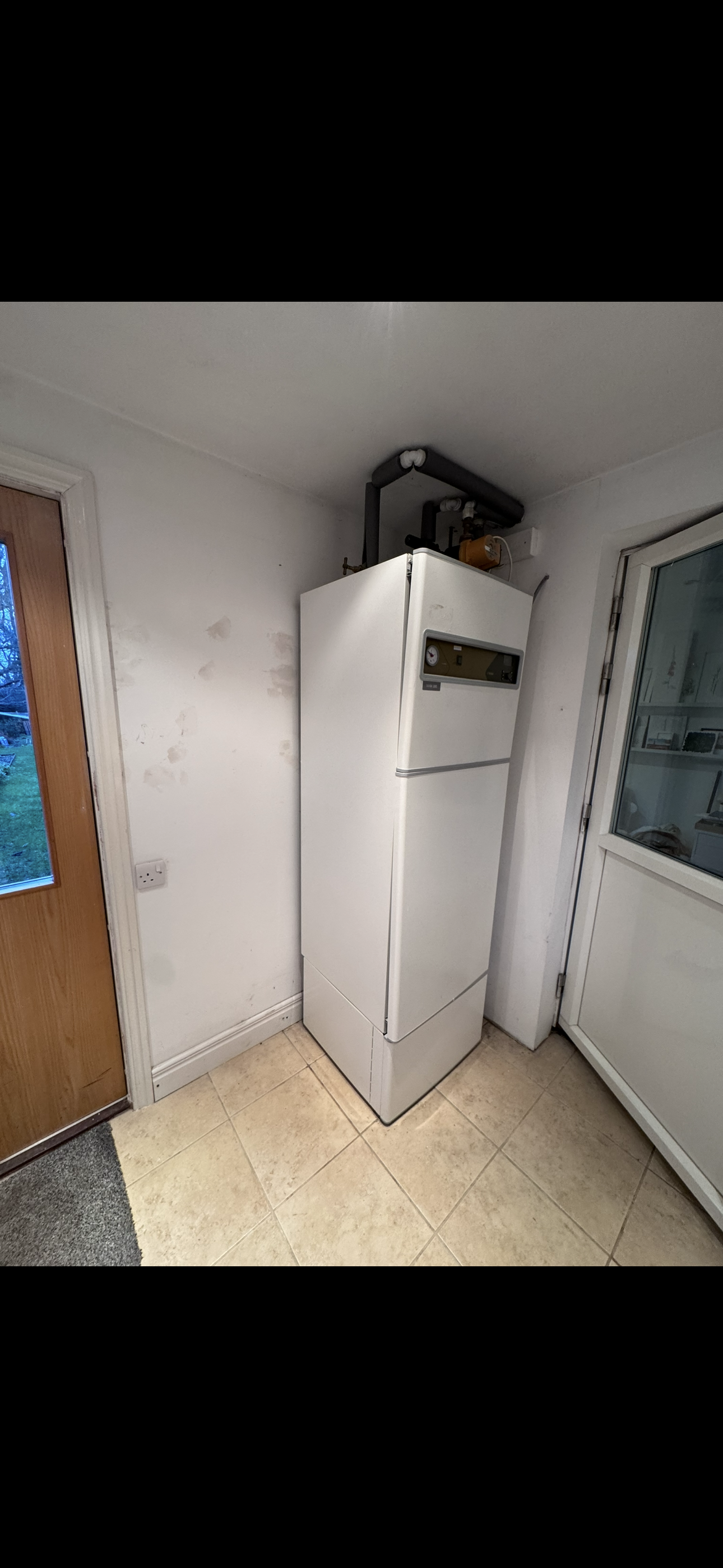 a utility room before a new heat pump cylinder was fitted, this was paired with a nibe fighter 2005 heat pump