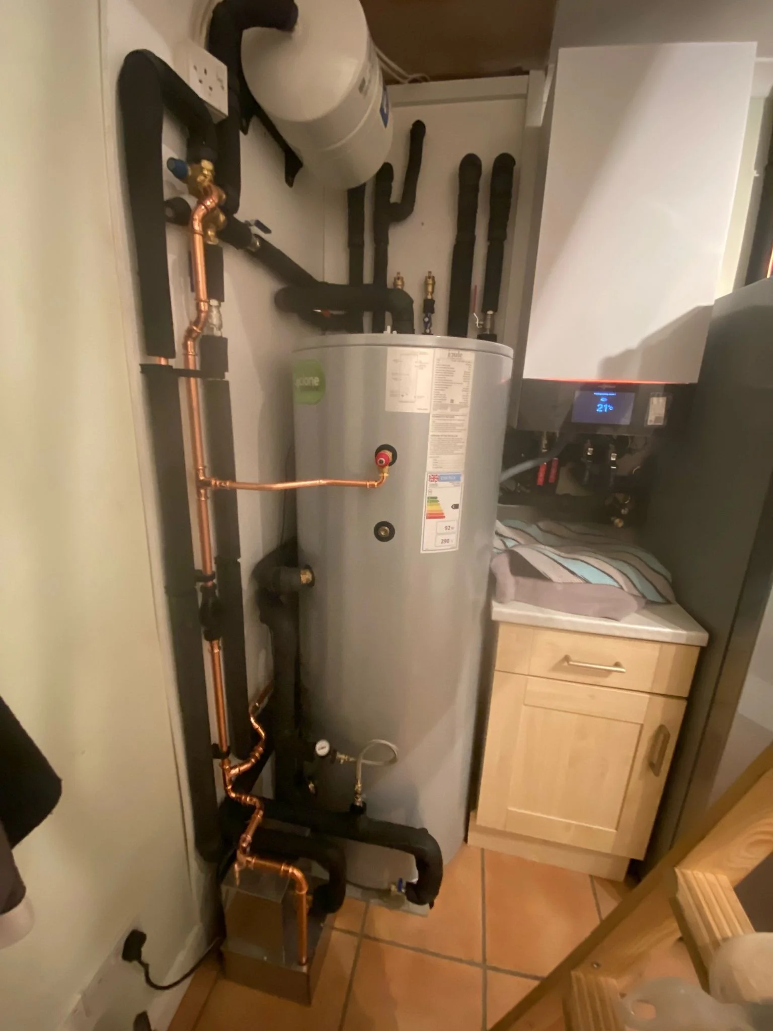 a hot water cylinder, and discharge pump in place of an old oil boiler, renewable heating - viessmann 150 - a