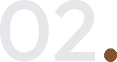 Gray pixelated shapes forming a pattern or symbol on a black background.