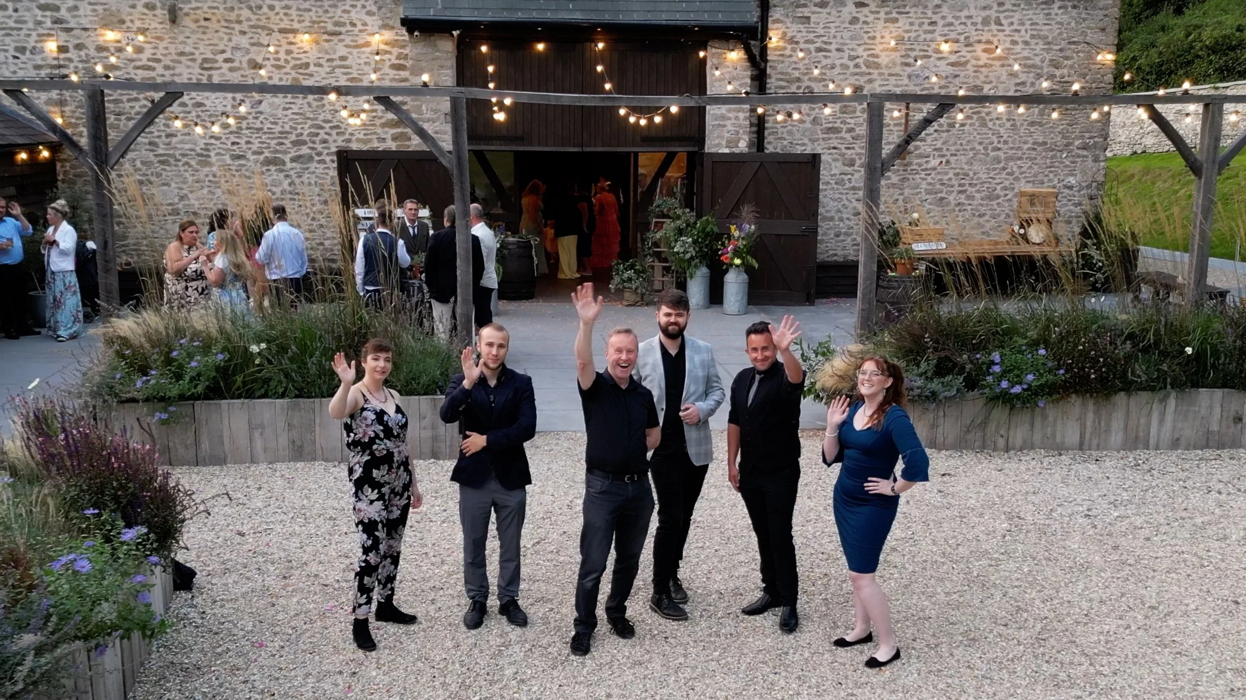 Exclusiv band's first gig at a rustic barn wedding venue
