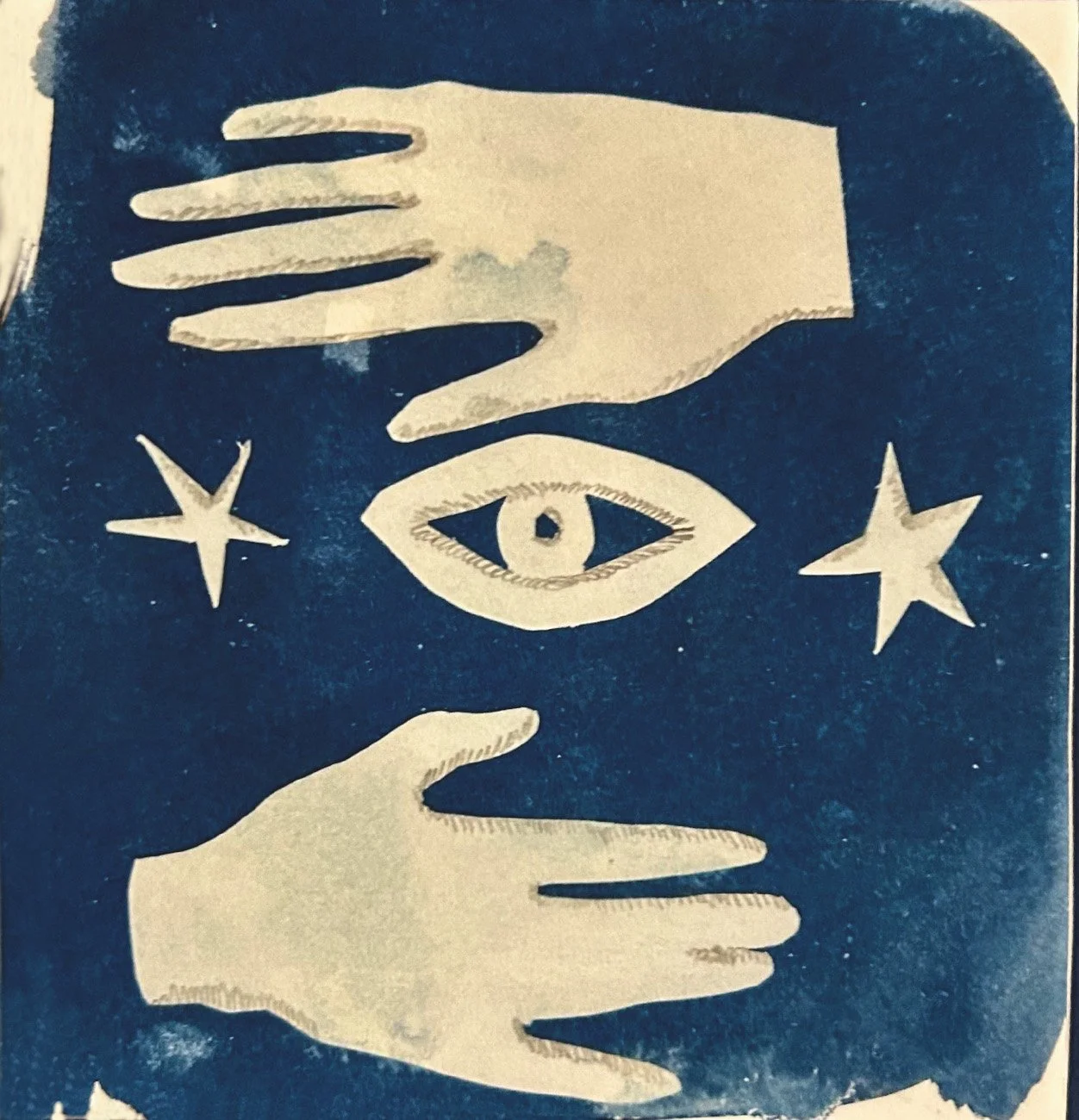 cyanotype print hand cut shapes eye stars and hands