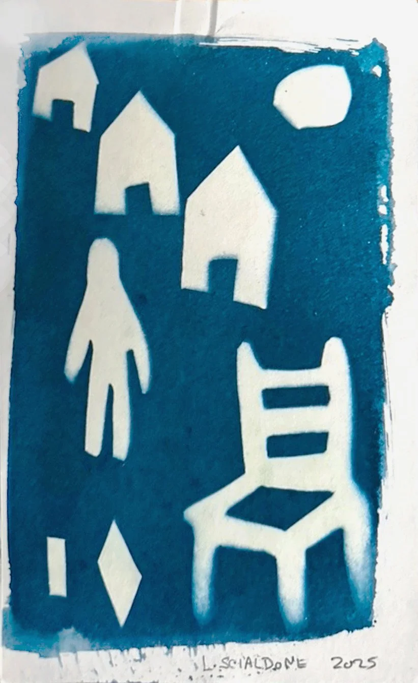 cyanotype print Stencil art featuring white silhouettes of houses, a person, and a chair on a blue background, with a circular shape resembling the moon in the upper right corner.