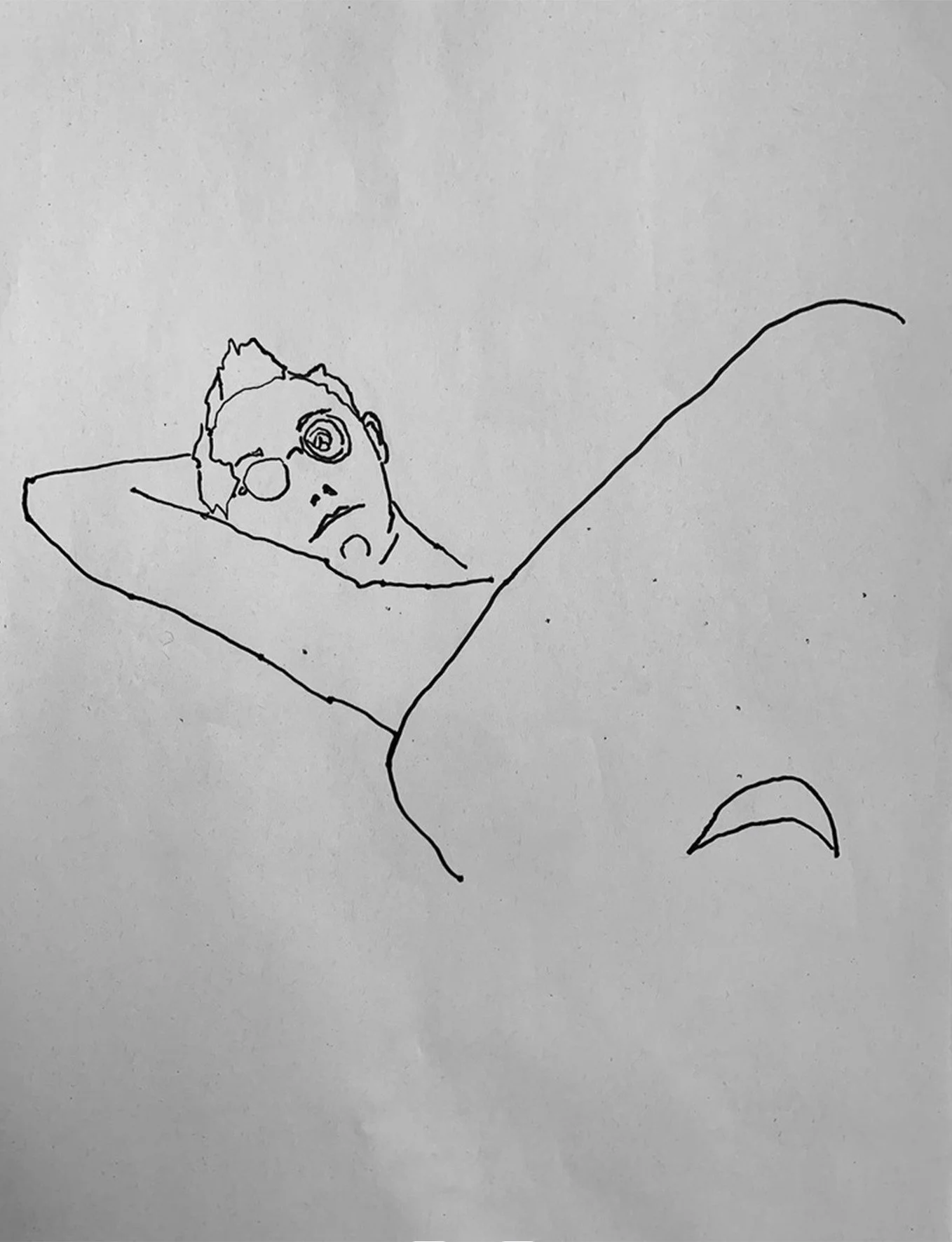 A simple line drawing of a person looking up whilst lying down. The person has one eye open. They have short hair and a sad or tired facial expression.