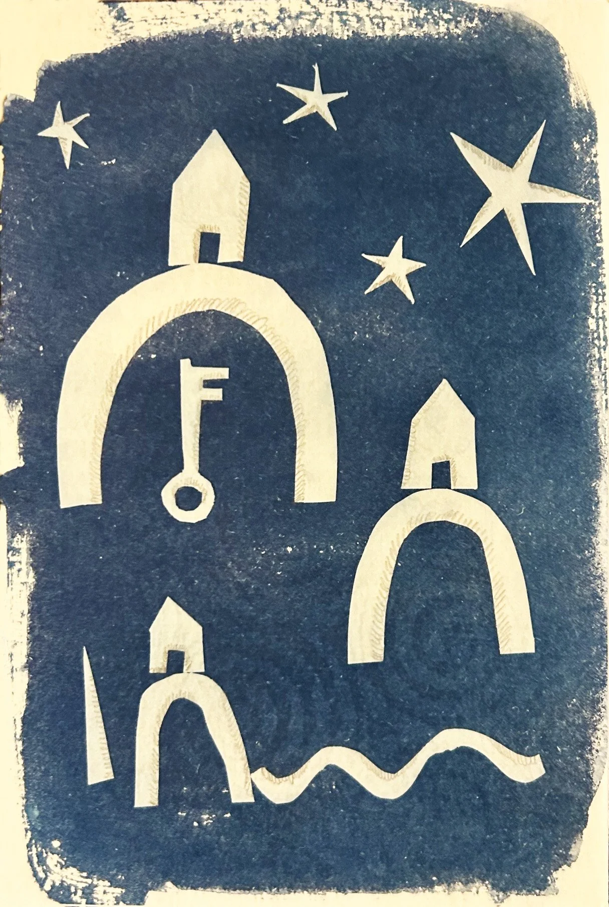 cyanotype print hand cut shapes houses on hills by the night sea