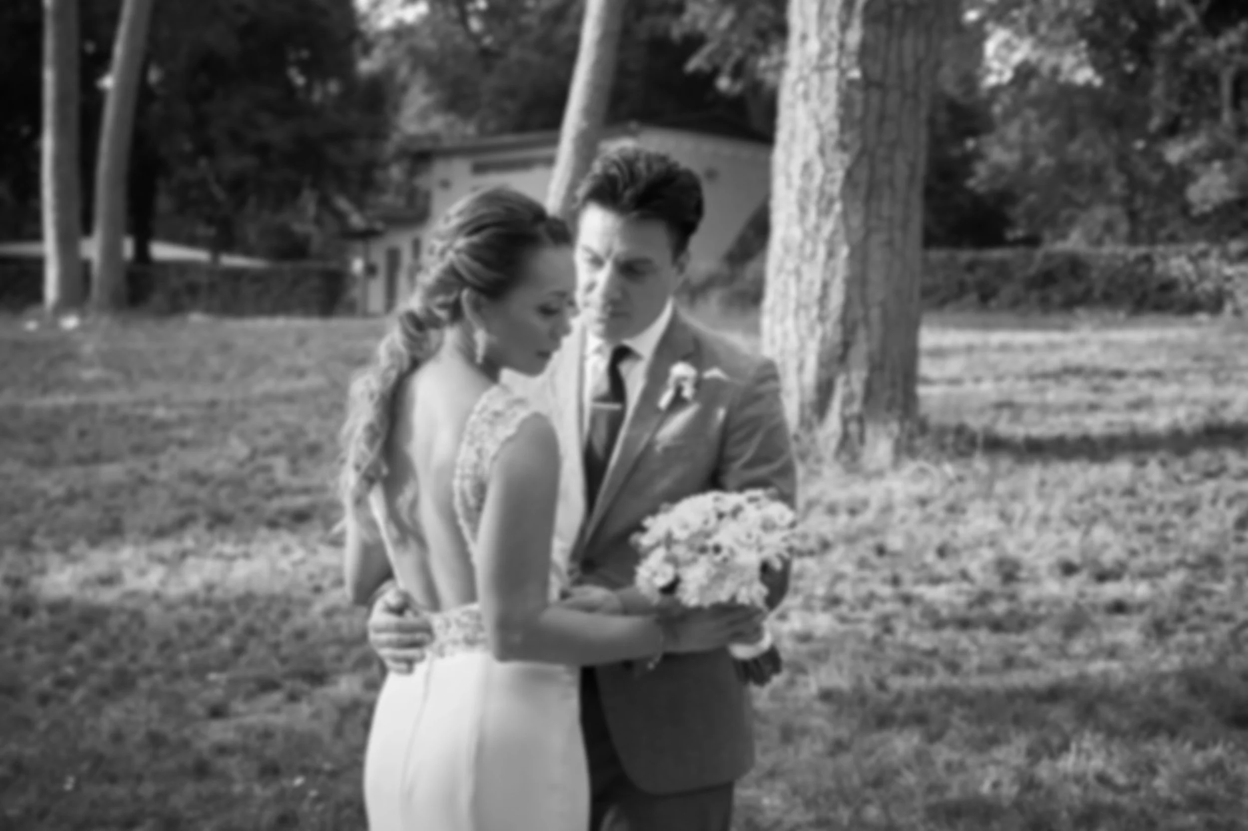 Bride and groom embracing in a Roman garden elopement — Rome Luxury Elopements