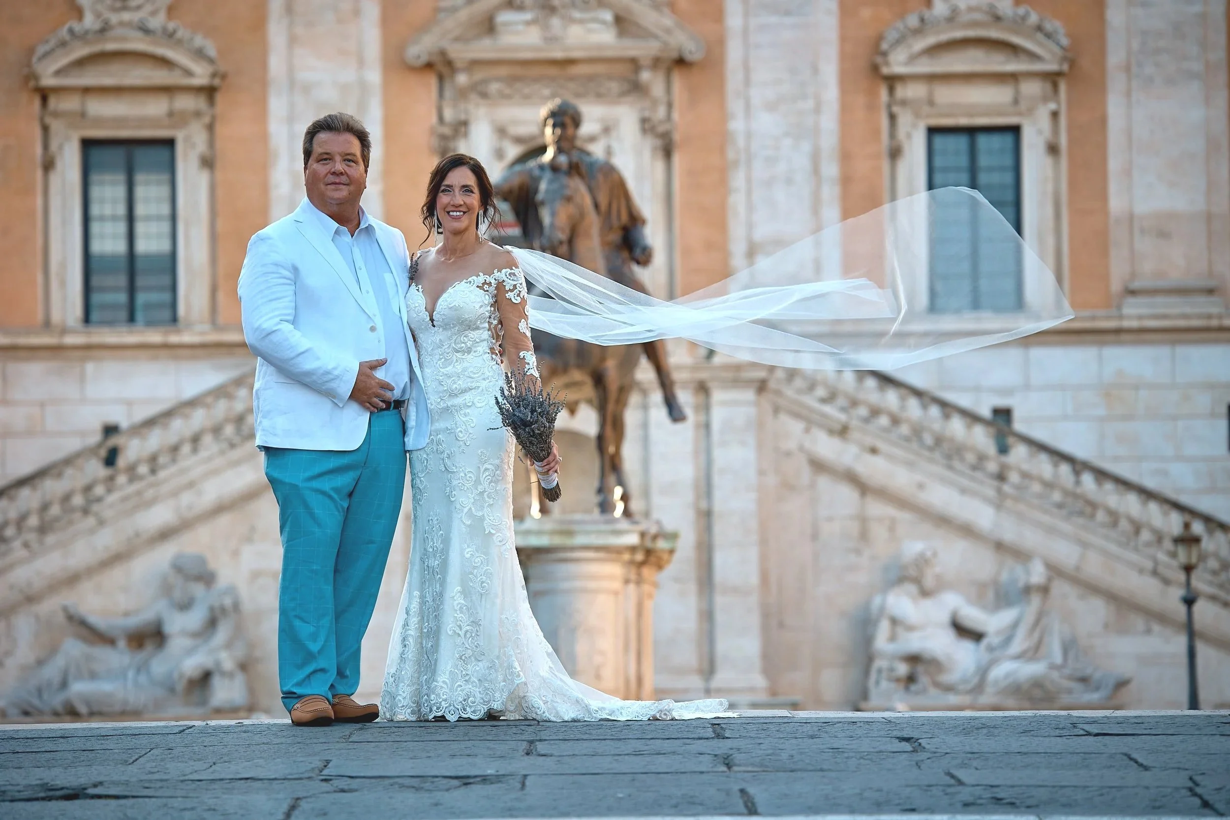 Bride and groom on the grand steps of a Rome palazzo — Rome Luxury Elopements