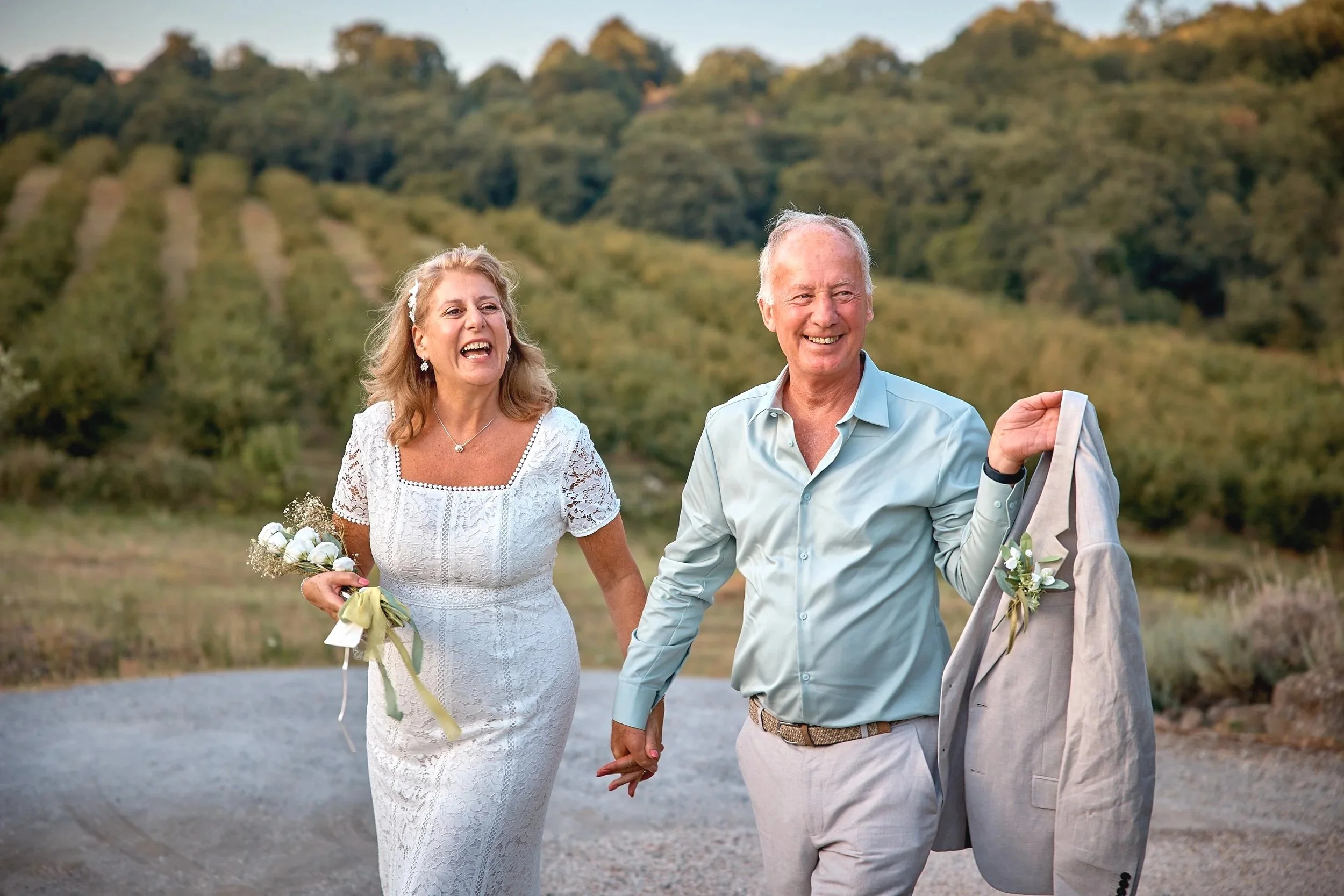 Couple at a countryside villa near Rome, vineyard behind — Rome Luxury Elopements