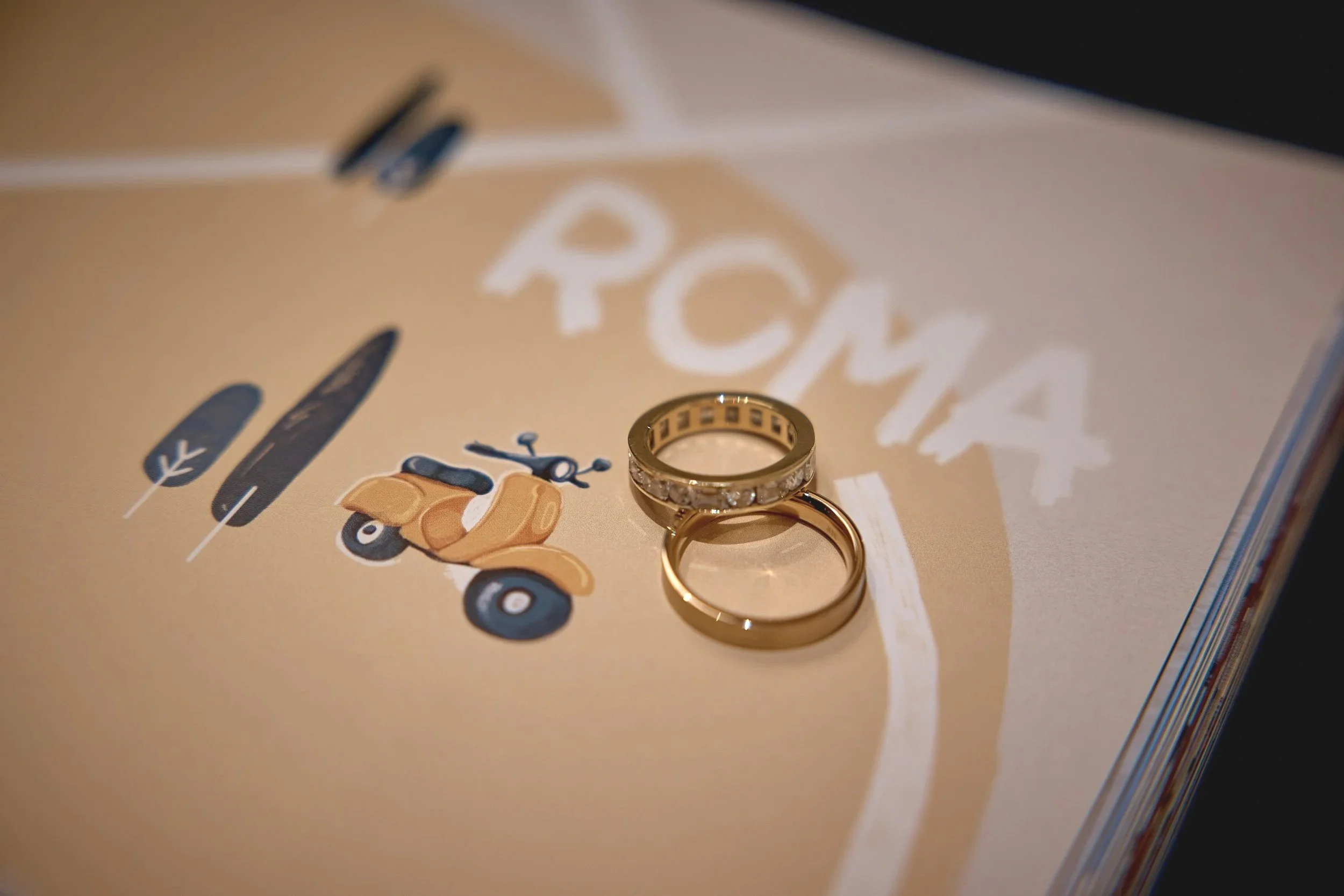 Wedding rings with a Vespa detail at a Roman elopement — Rome Luxury Elopements