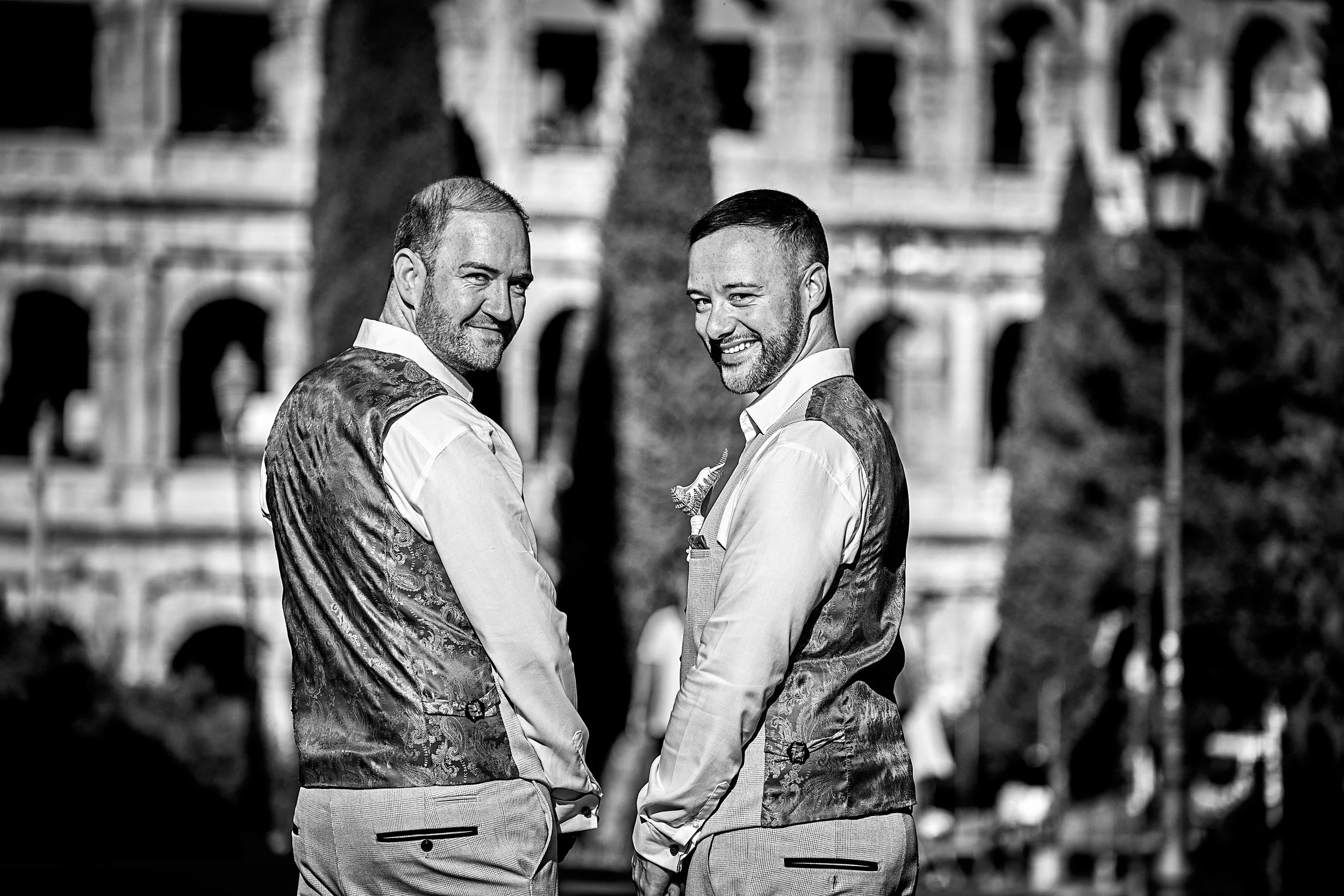 Two grooms at their elopement by the Colosseum in Rome — Rome Luxury Elopements