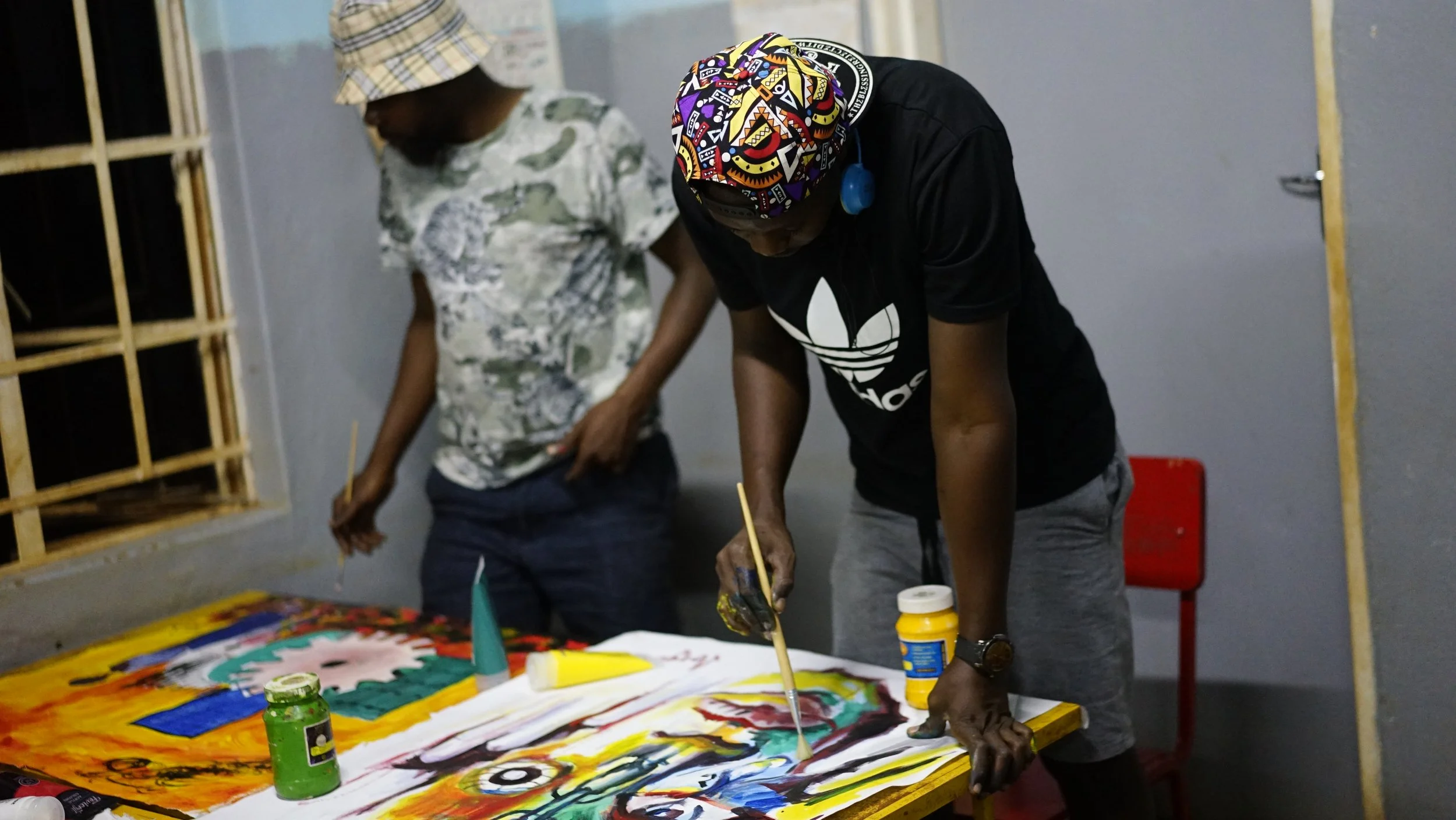Sergio Mbayo and François Bangwe are refugee visual artists from Democratic Republic of Congo living at the Dzaleka Refugee Camp in Malawi. As part of the Tumaini Festival they generated visual symbolic systems in response to algorithmic survellance